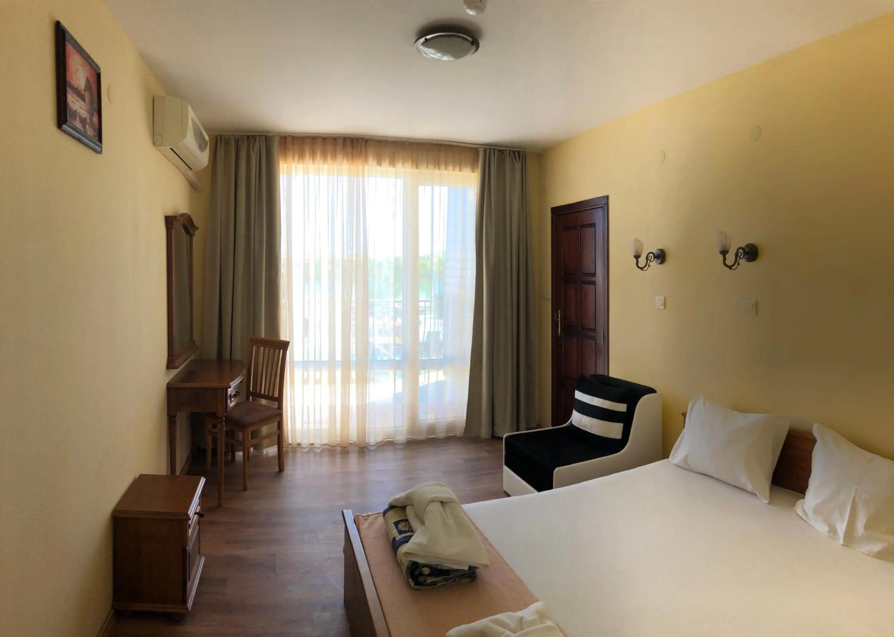 Bed in Family Hotel Littoral