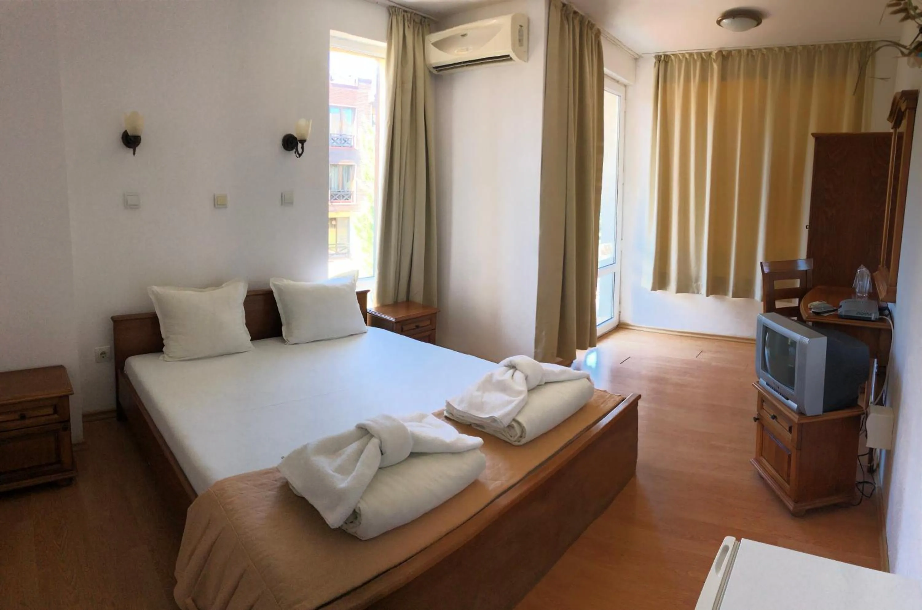 Bed in Family Hotel Littoral