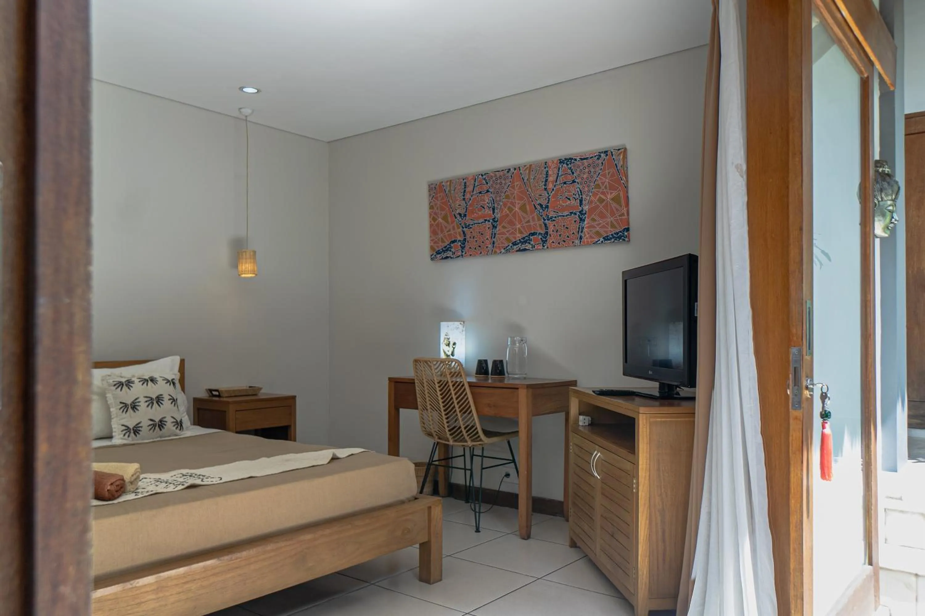 Bed in Balinea Holiday Home