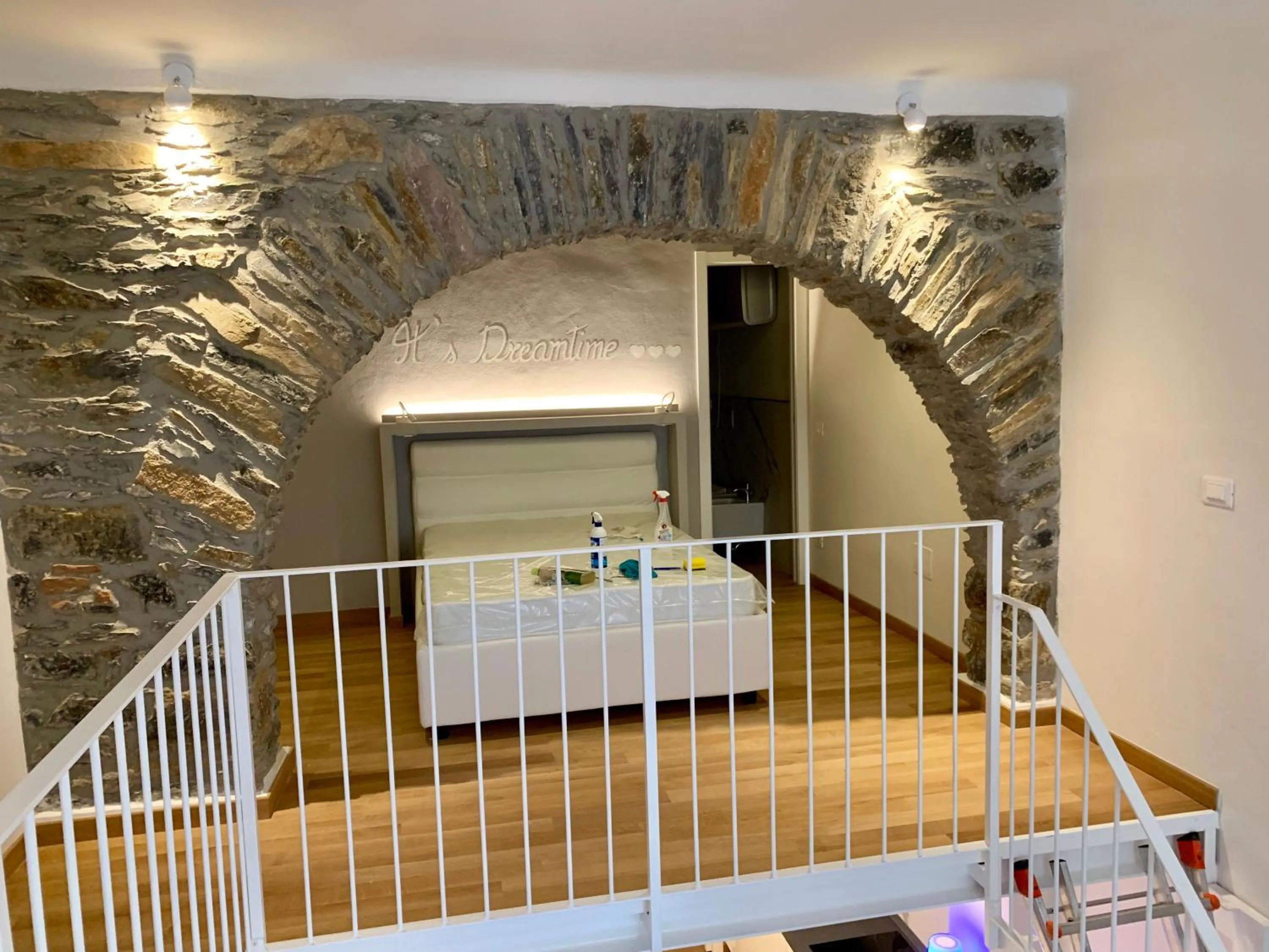 Photo of the whole room, Bed in Center Loft Apartment