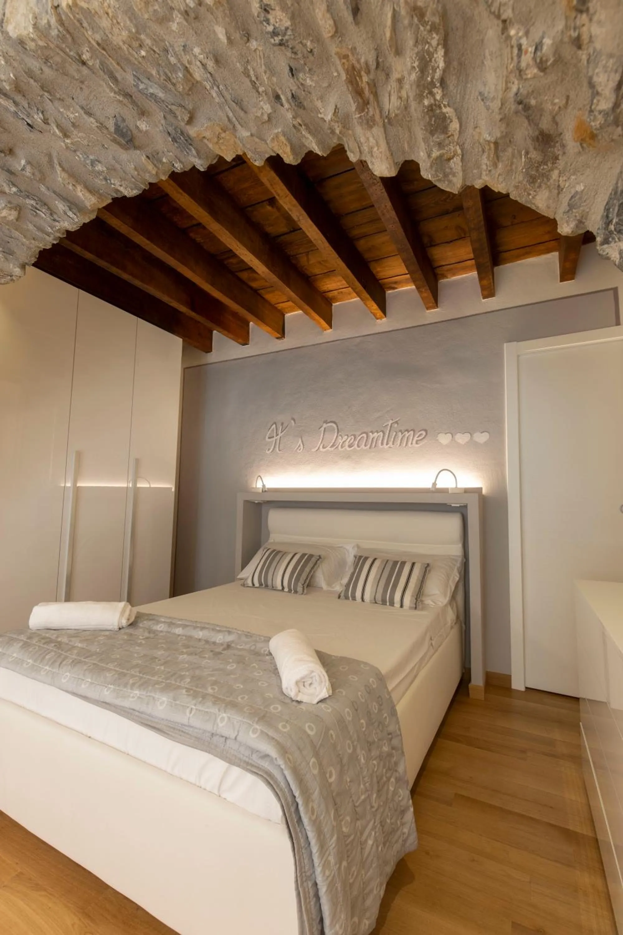 Photo of the whole room, Bed in Center Loft Apartment