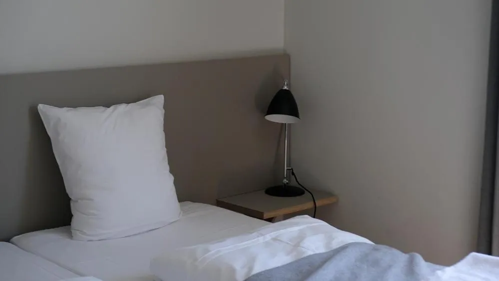 Bed in Hotel Saxkjøbing