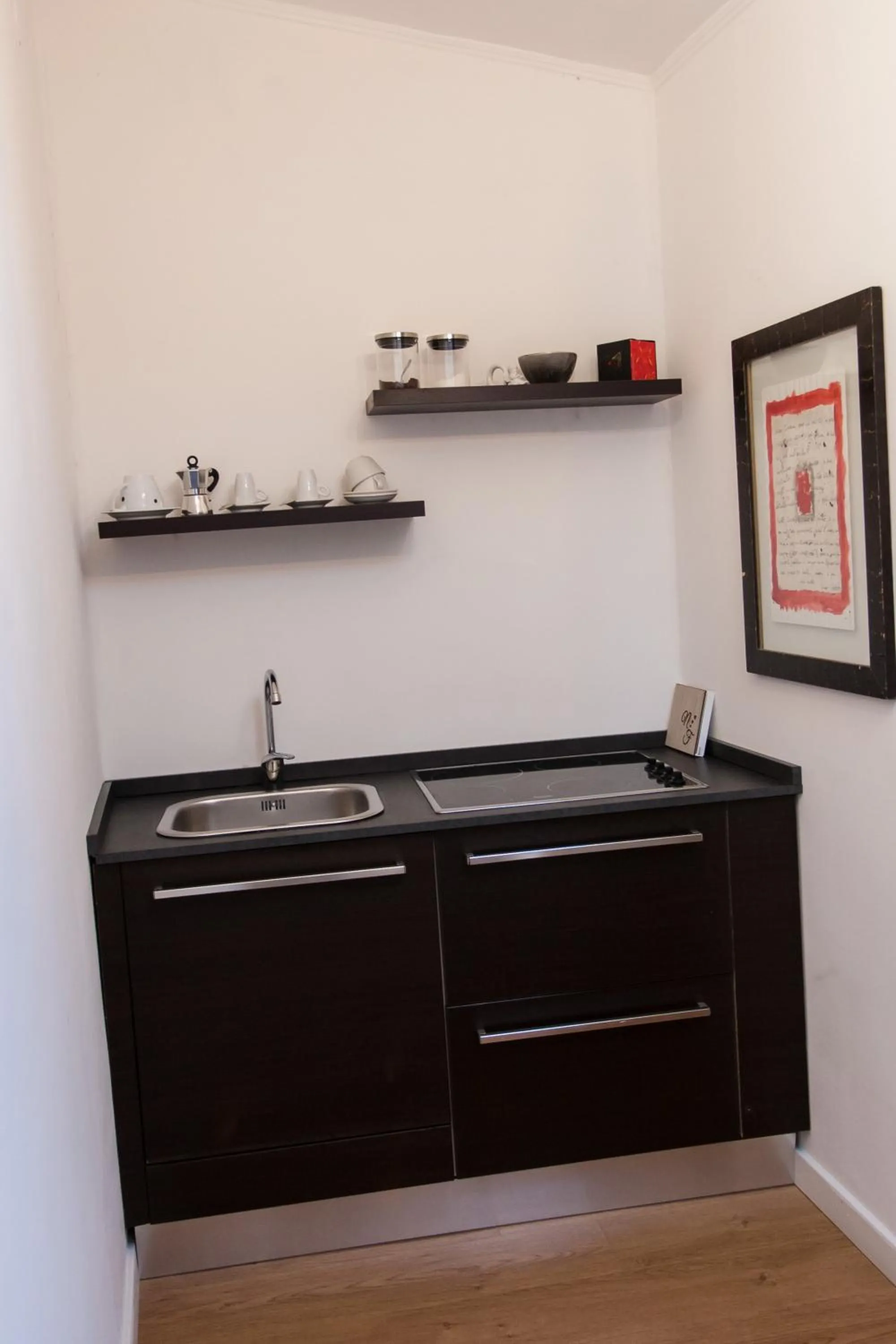 Kitchen or kitchenette in B&B La Cuntana