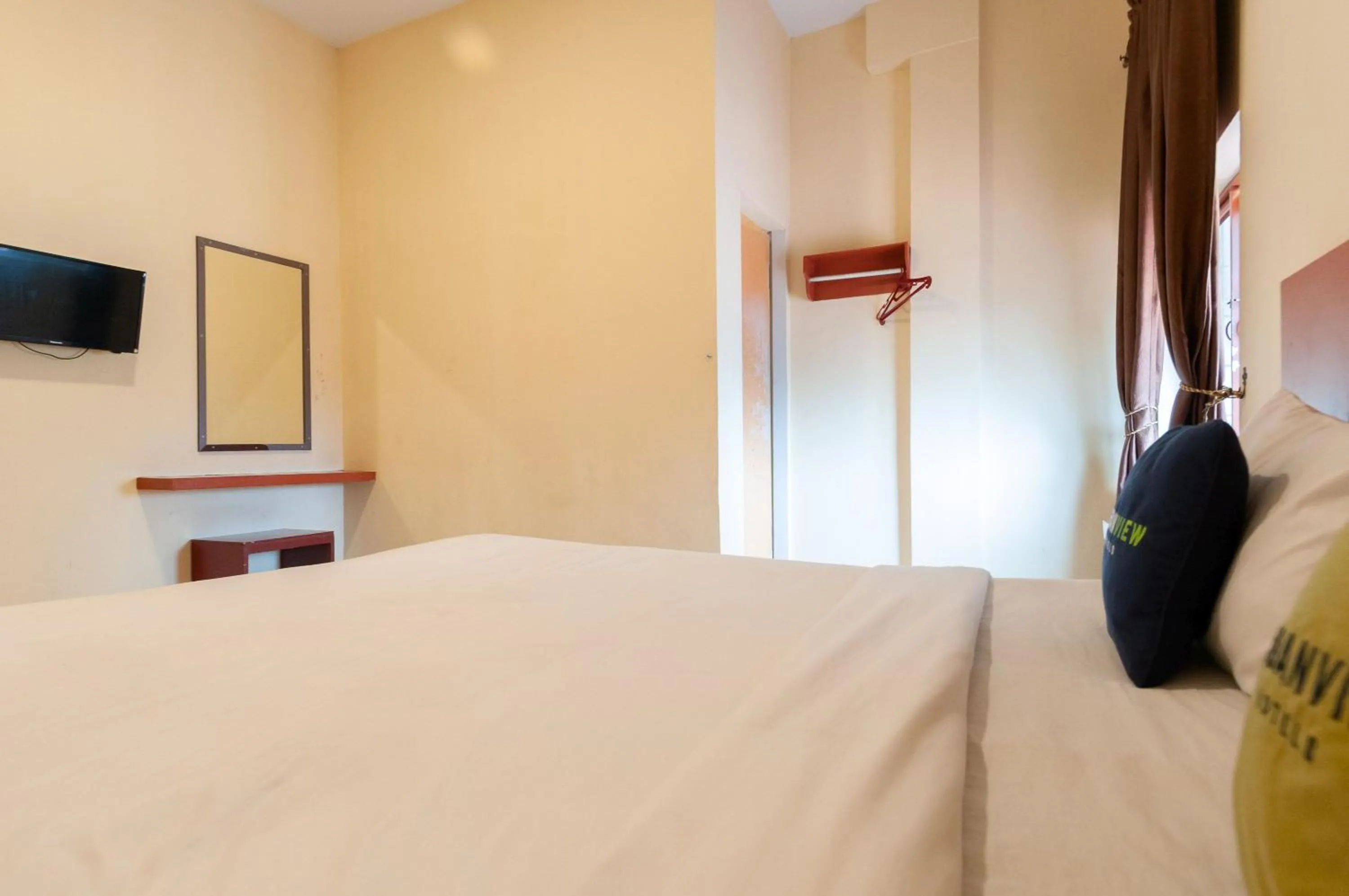 Bedroom in Urbanview Hotel Syariah Residence Medan by RedDoorz