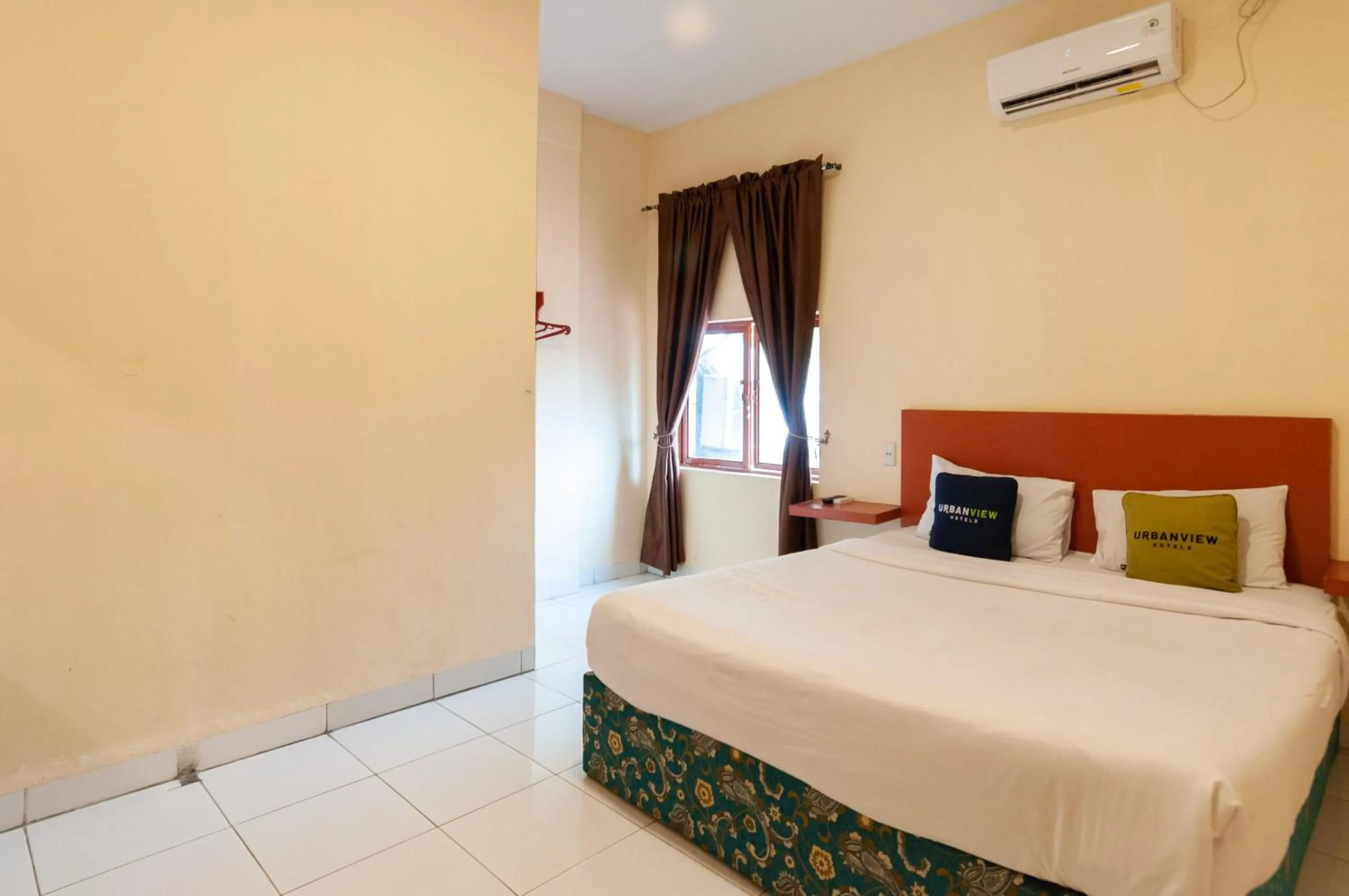 Bedroom in Urbanview Hotel Syariah Residence Medan by RedDoorz