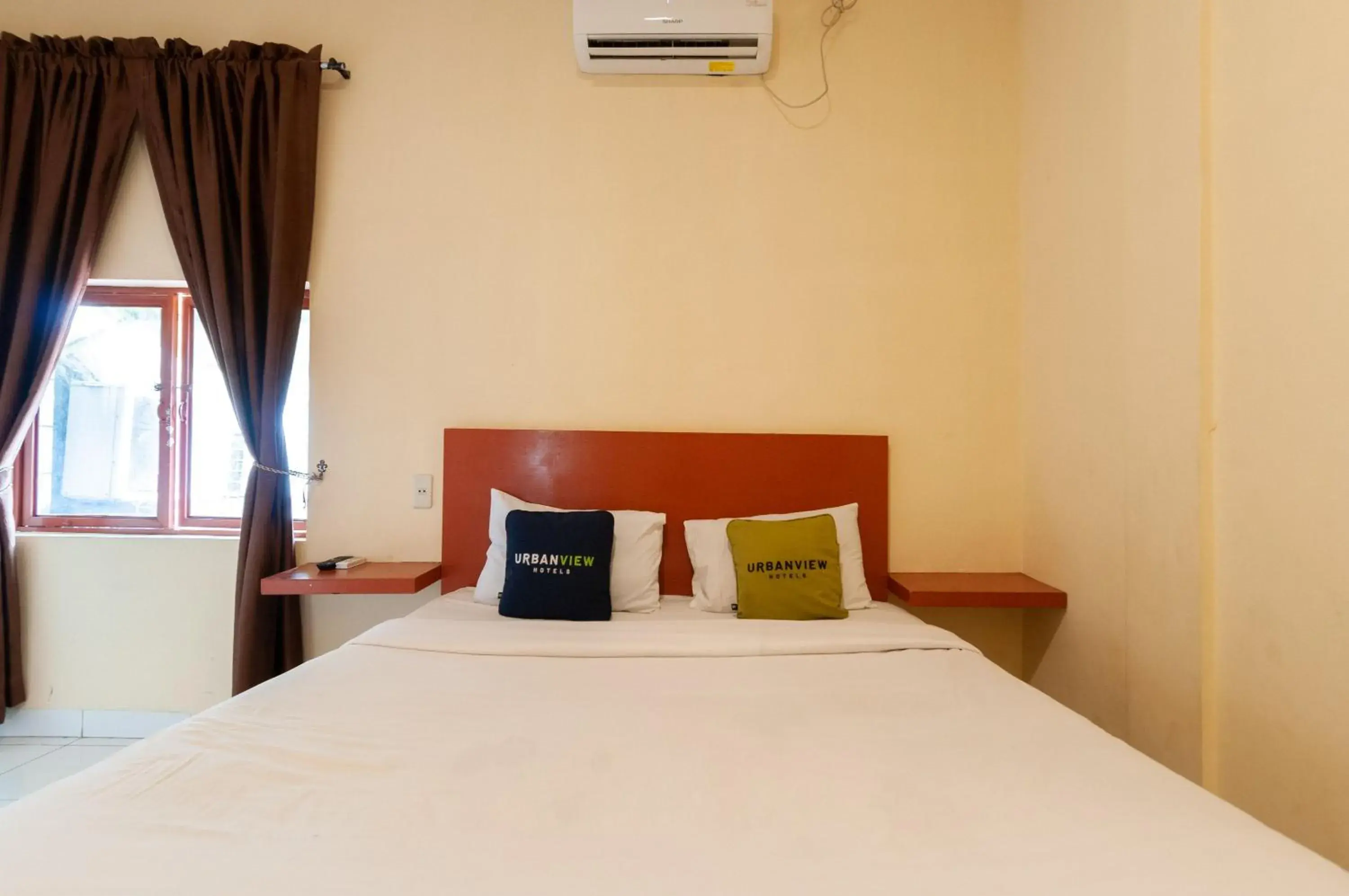 Bedroom in Urbanview Hotel Syariah Residence Medan by RedDoorz Bedroom in Urbanview Hotel Syariah Residence Medan by RedDoorz