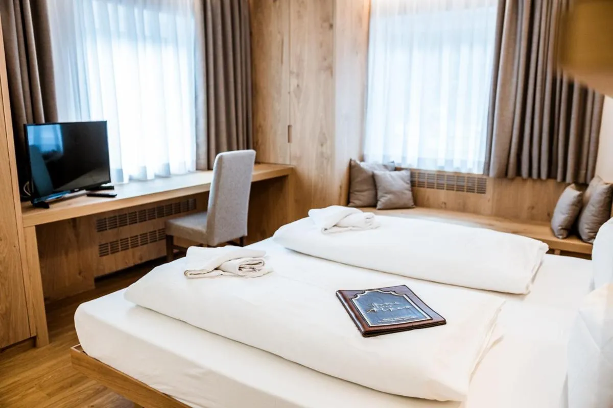 Bed in Hotel Des Alpes