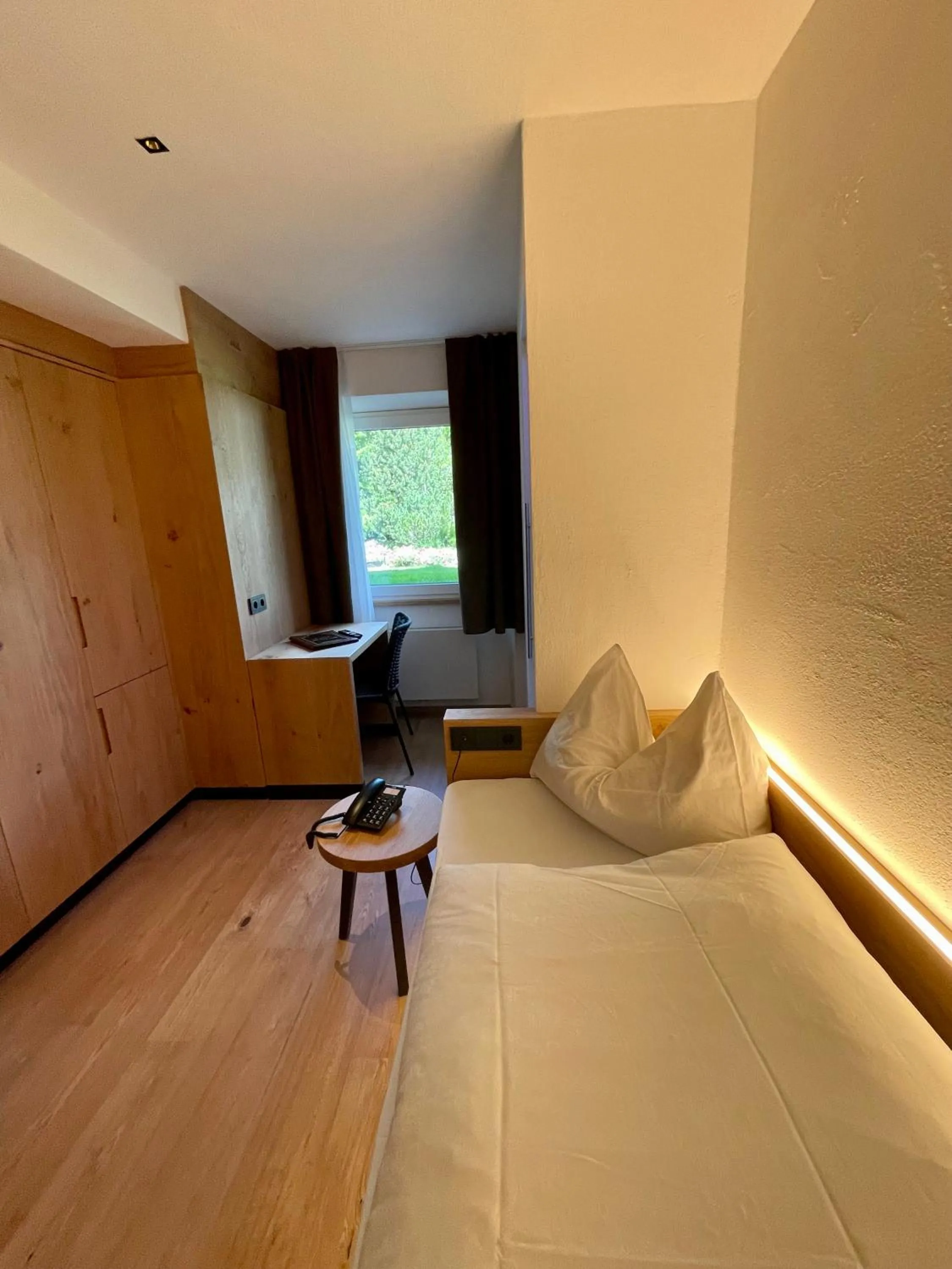 Bed in Hotel Des Alpes