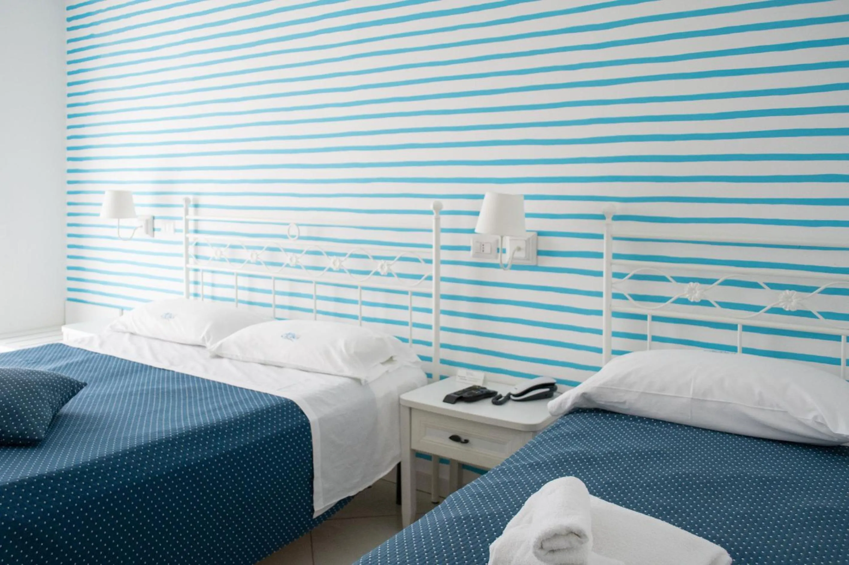 Bed in Hotel Calanca