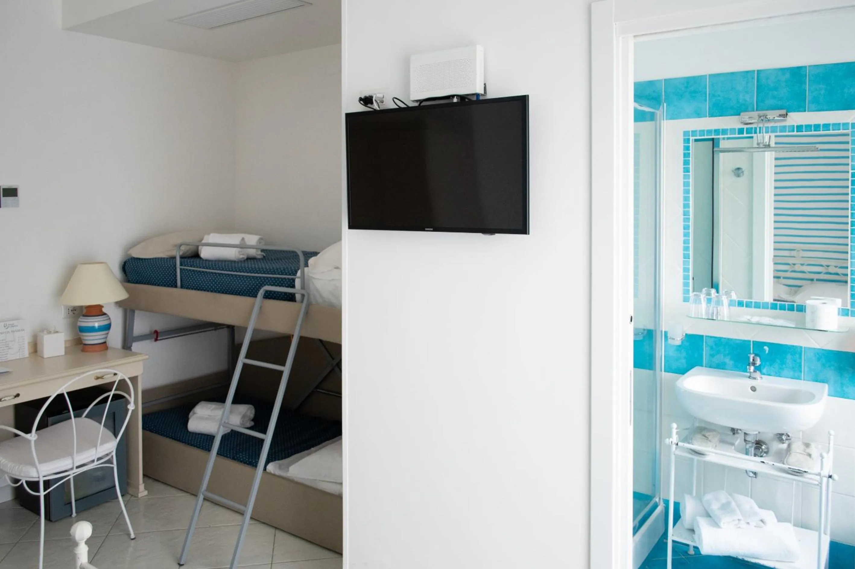 Bedroom in Hotel Calanca