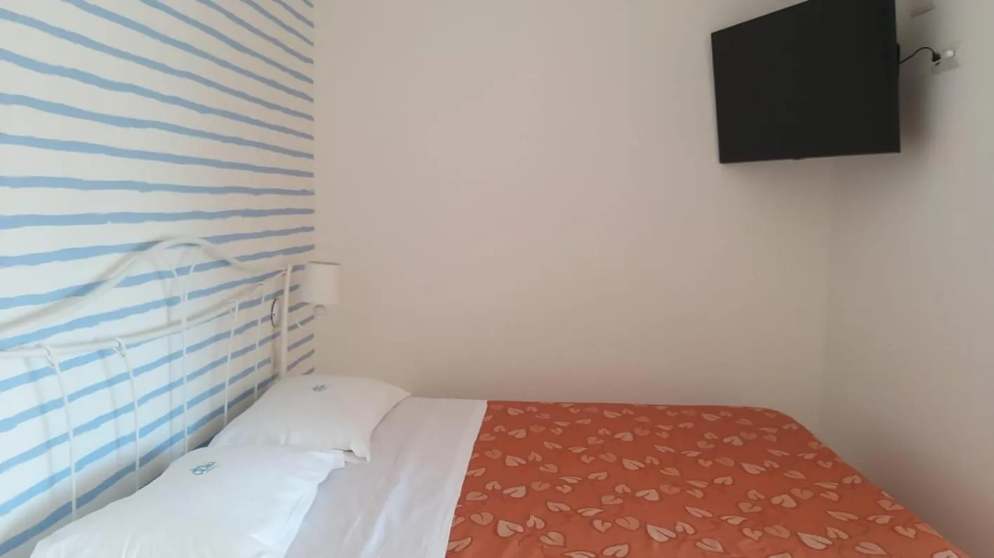 Bed in Hotel Calanca