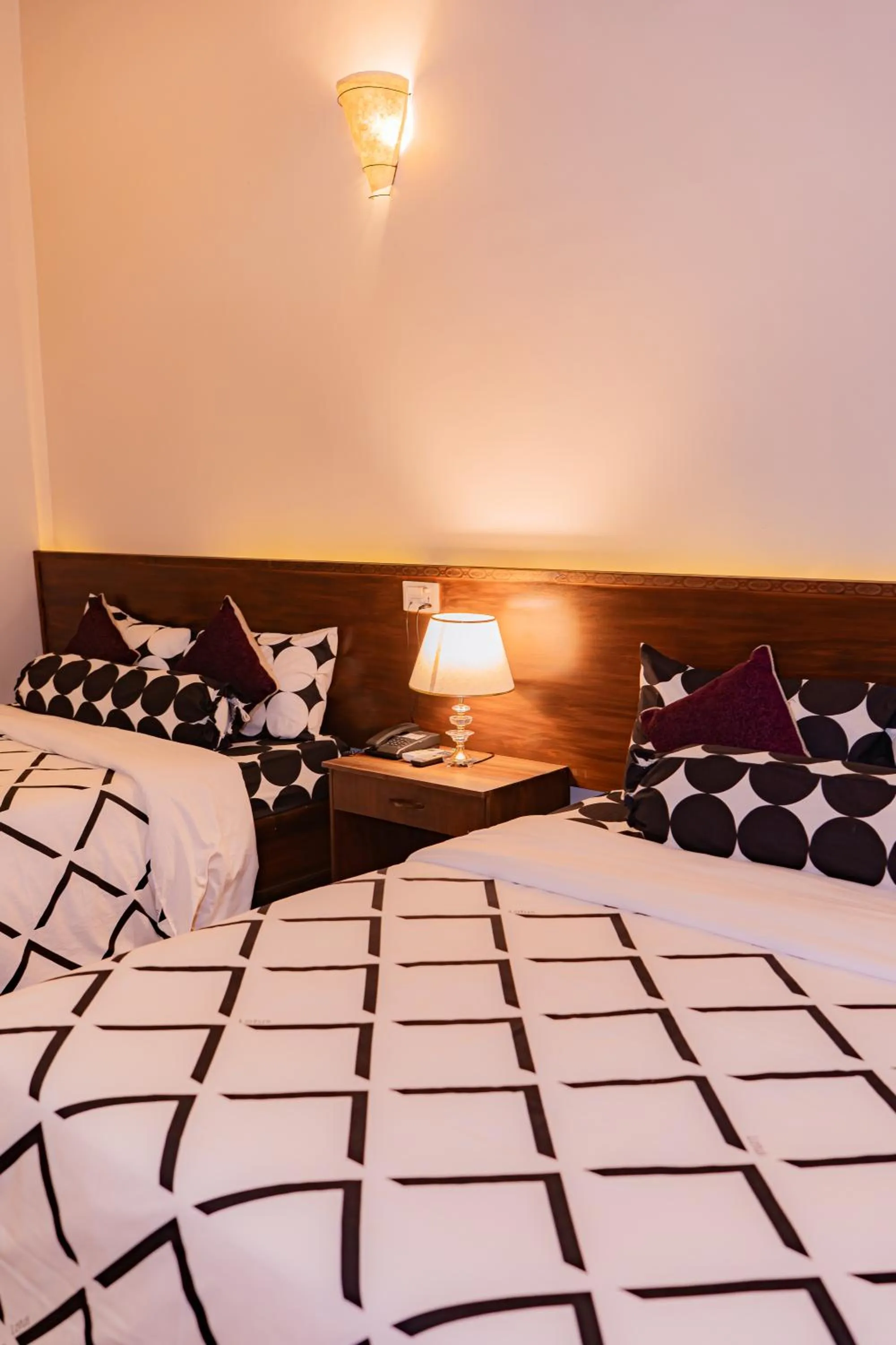 Bed in Busy Bee Resort, Pokhara