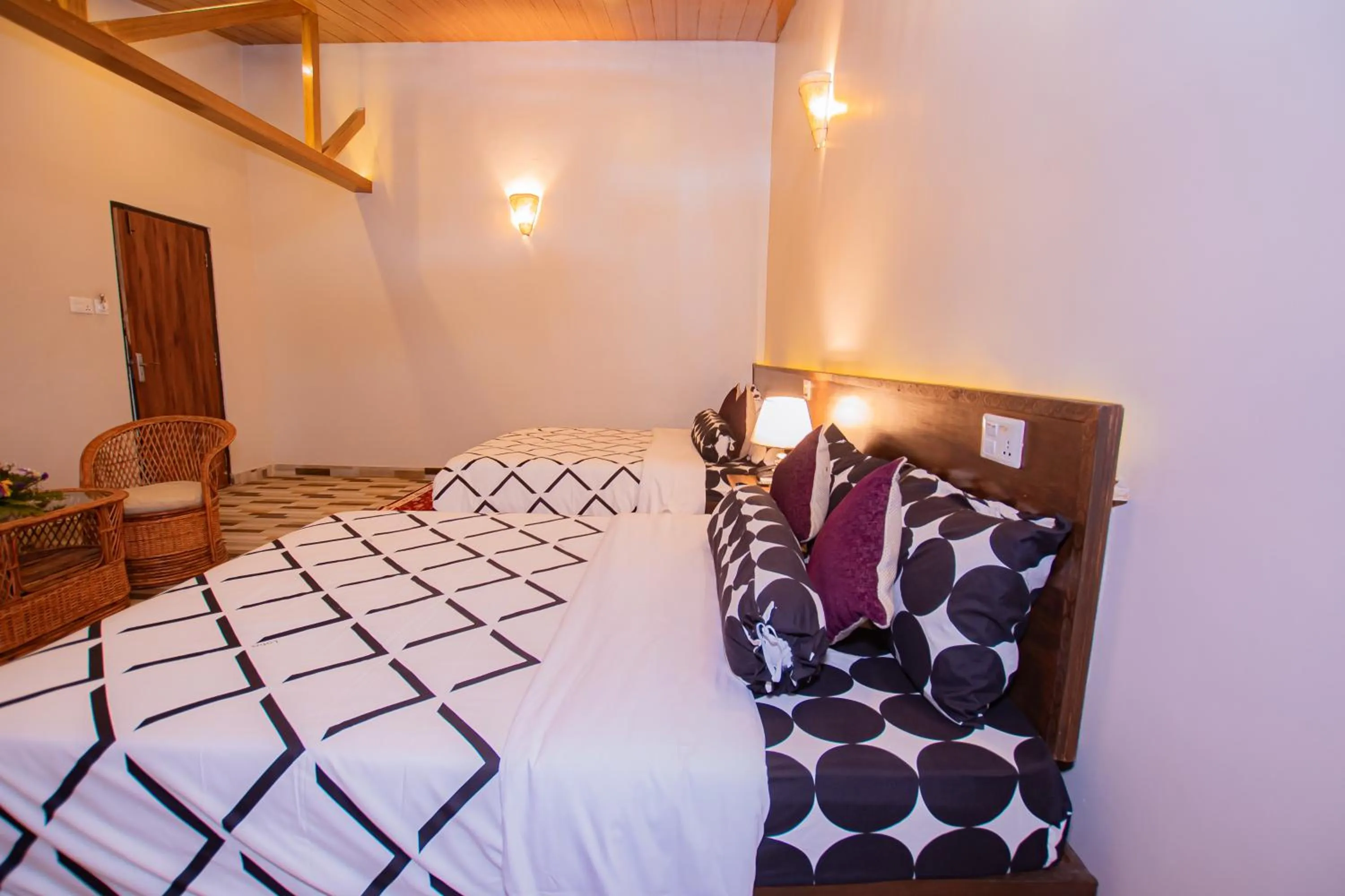 Bed in Busy Bee Resort, Pokhara