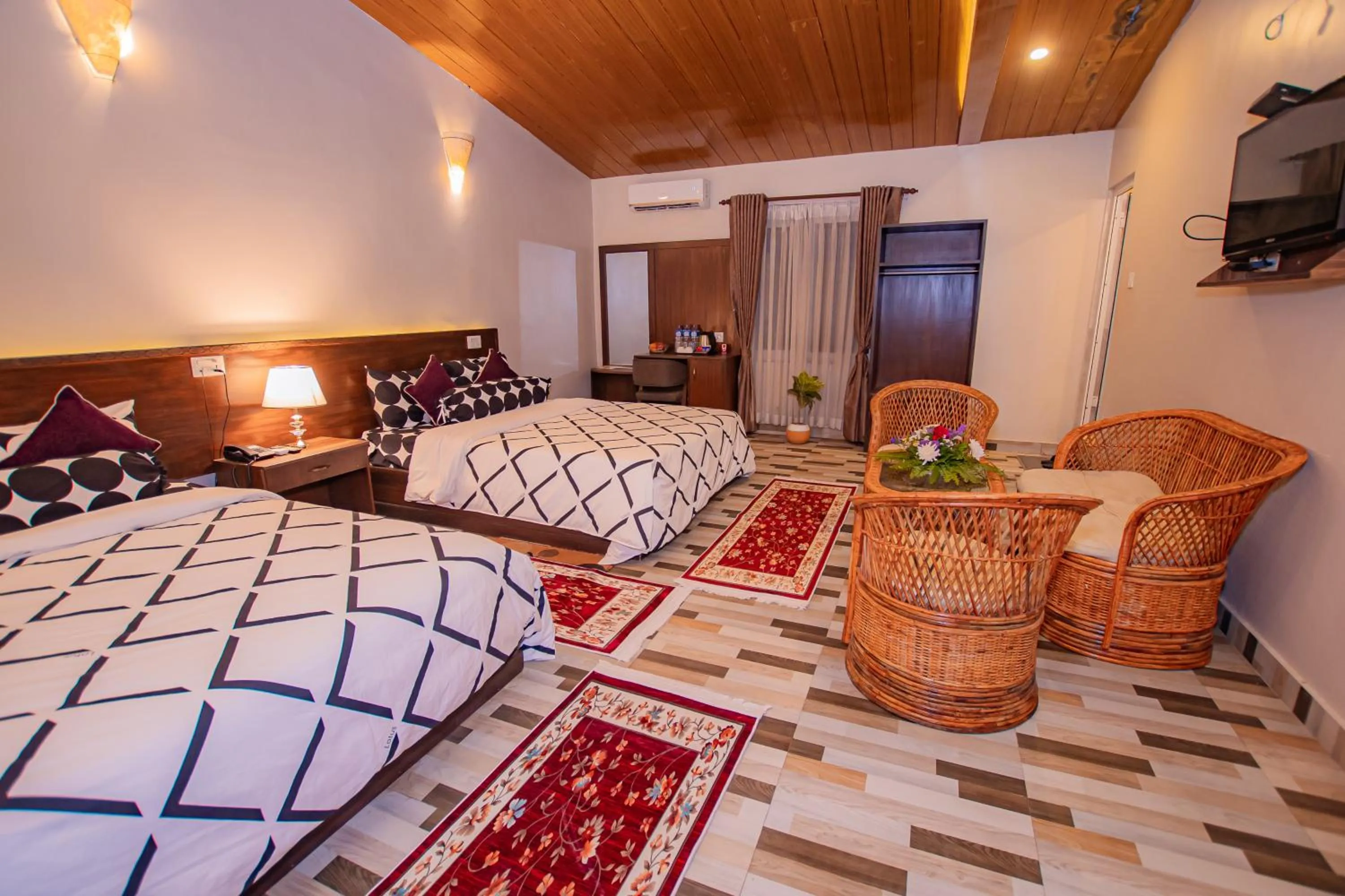 Bed in Busy Bee Resort, Pokhara