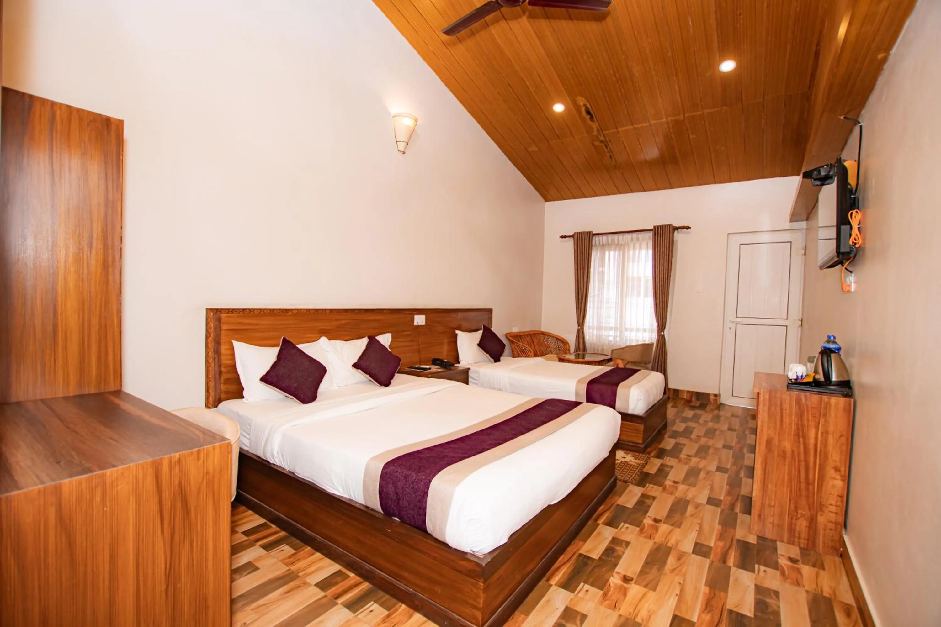 Photo of the whole room, Bed in Busy Bee Resort, Pokhara