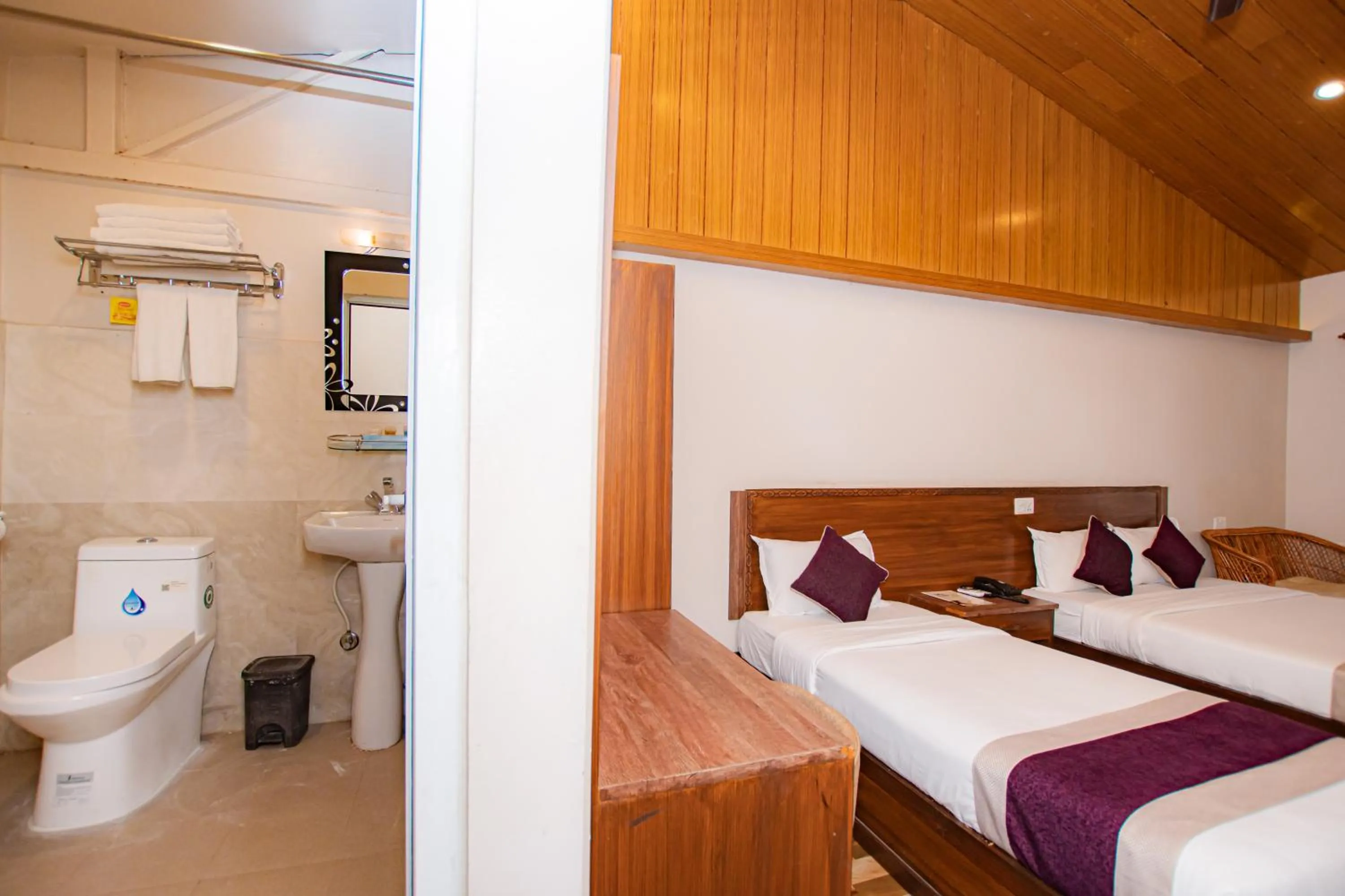 Bed in Busy Bee Resort, Pokhara