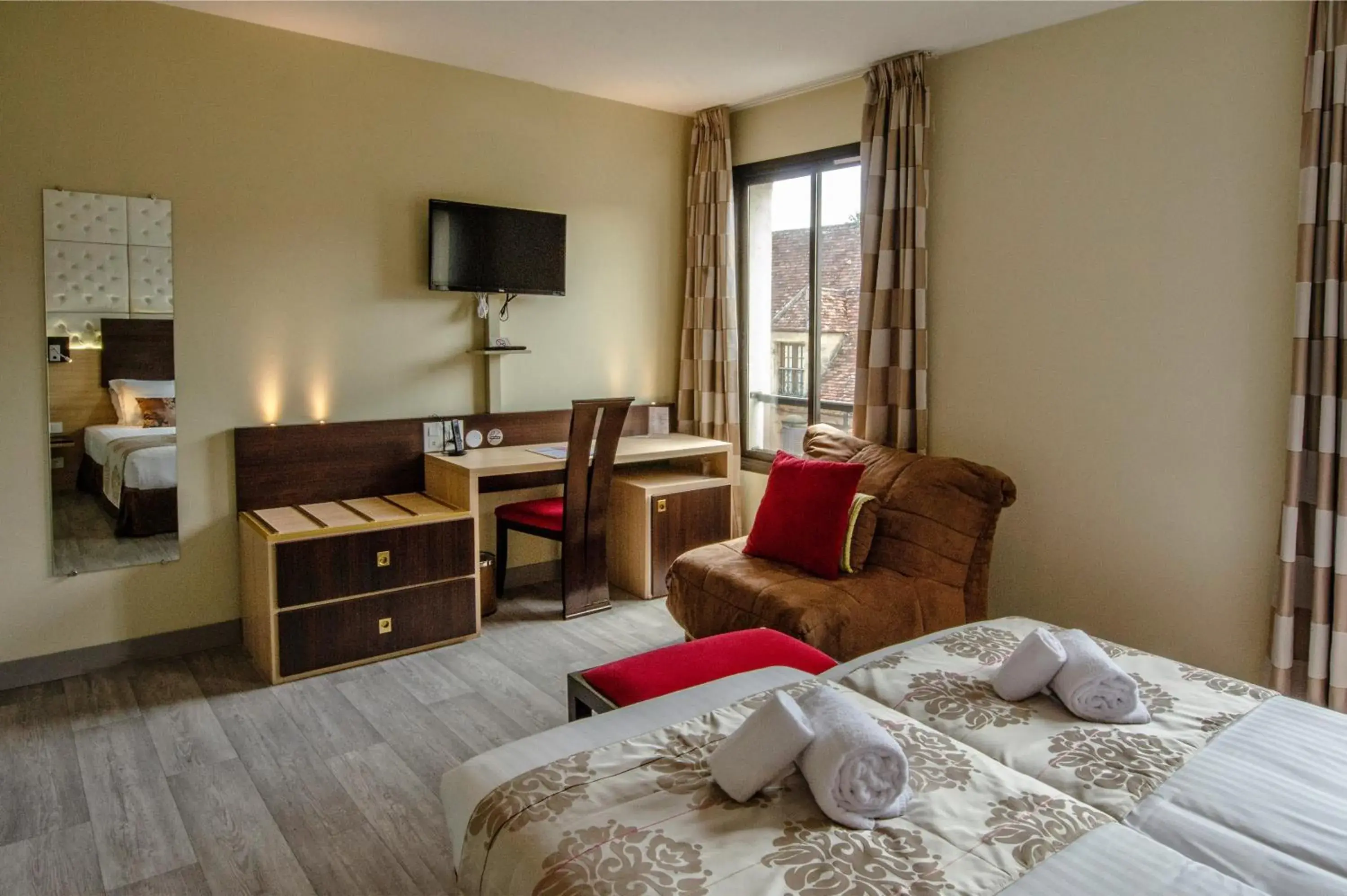 Bed in Au Grand Hôtel de Sarlat - Pavillon de SELVES Bed in Au Grand Hôtel de Sarlat - Pavillon de SELVES