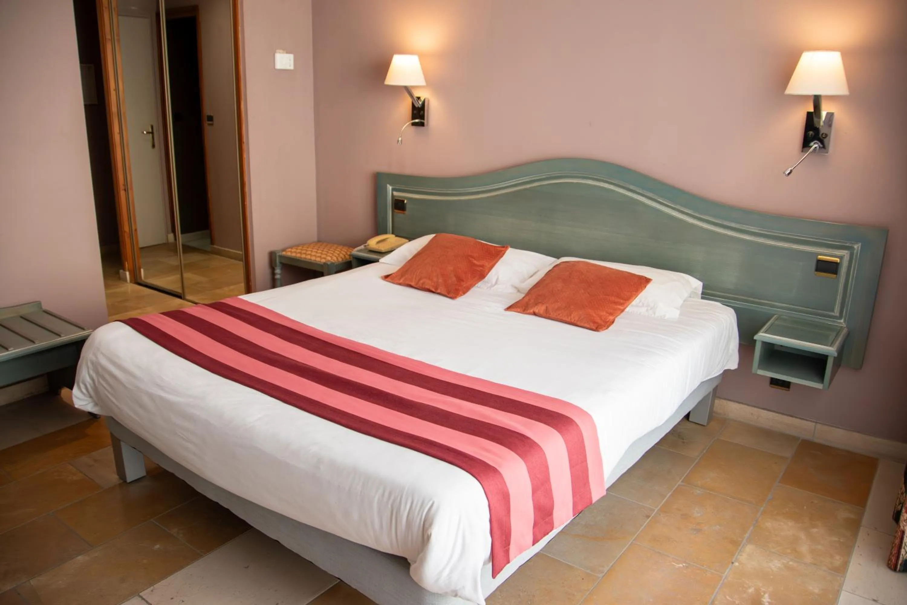 Bed in Logis Le Saint Nicolas