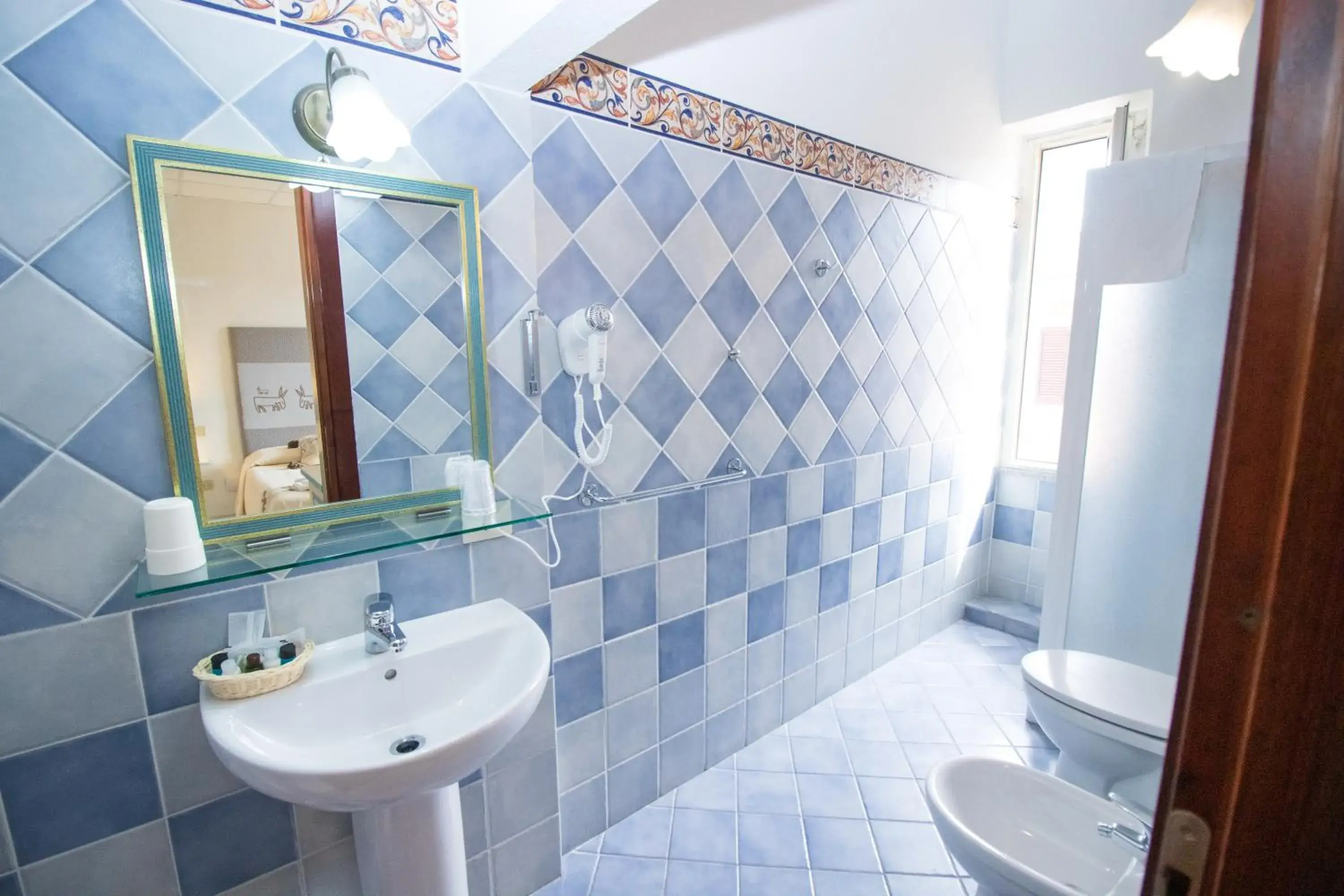 Triple Room - single occupancy in Hotel Canne al Vento Triple Room - single occupancy in Hotel Canne al Vento