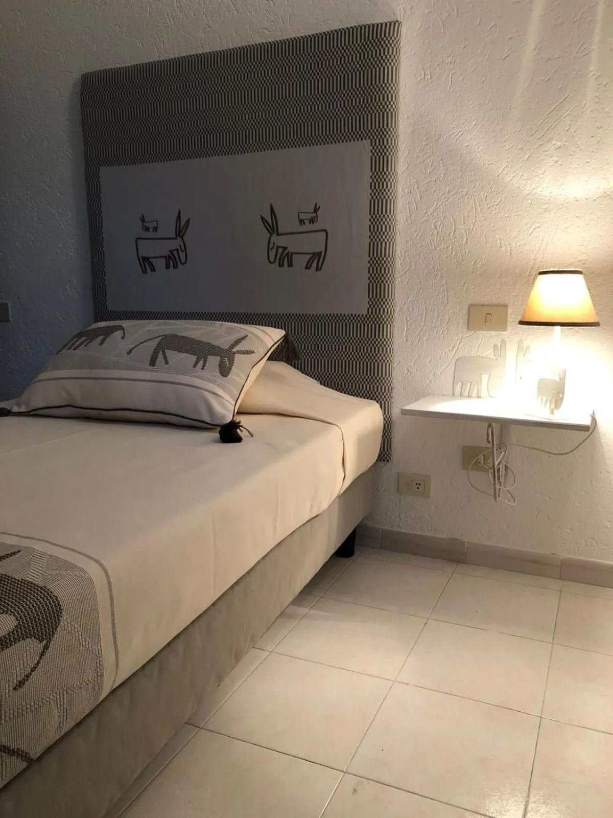 Bed in Hotel Canne al Vento