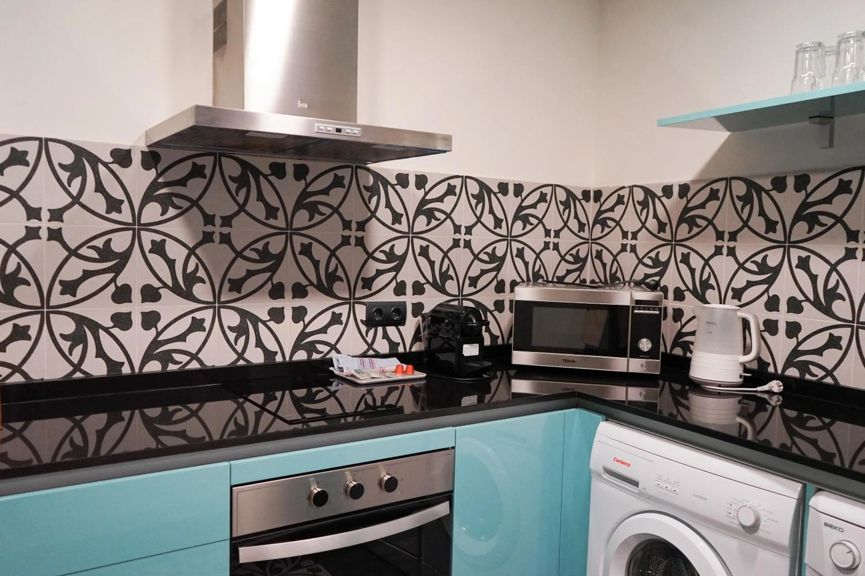 kitchen in Aqua Apartments Málaga