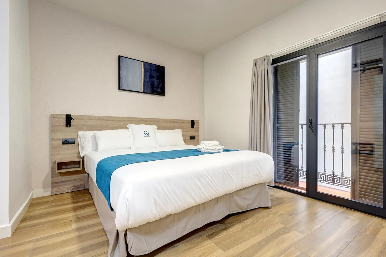 Bed in Aqua Apartments Málaga