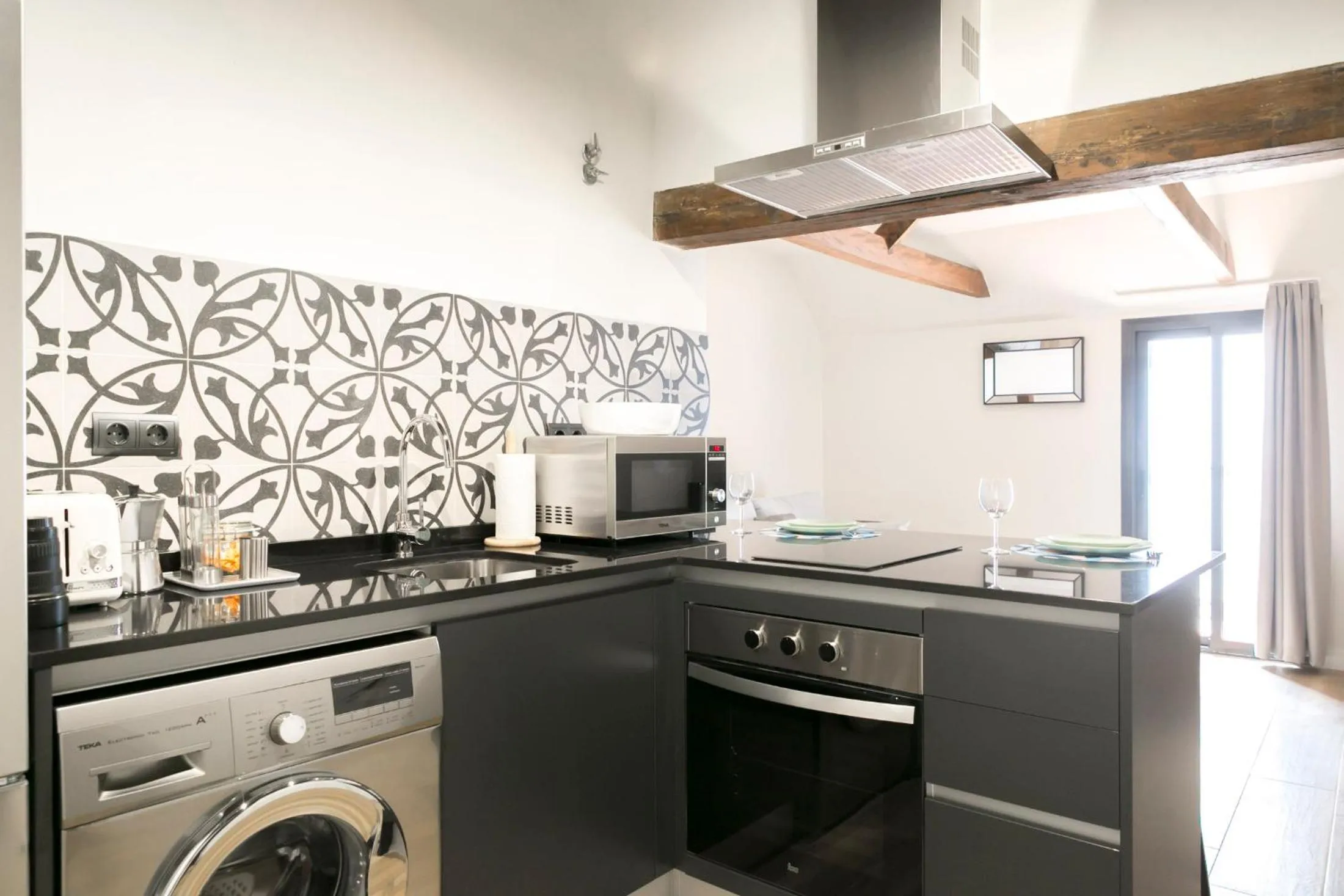 Kitchen or kitchenette in Aqua Apartments Málaga