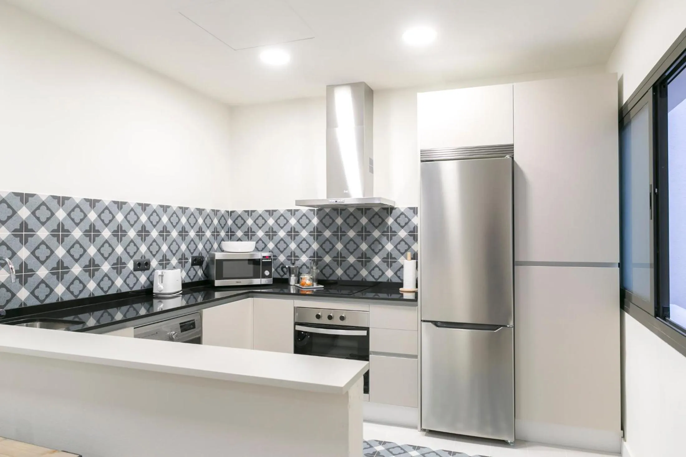 Kitchen or kitchenette in Aqua Apartments Málaga