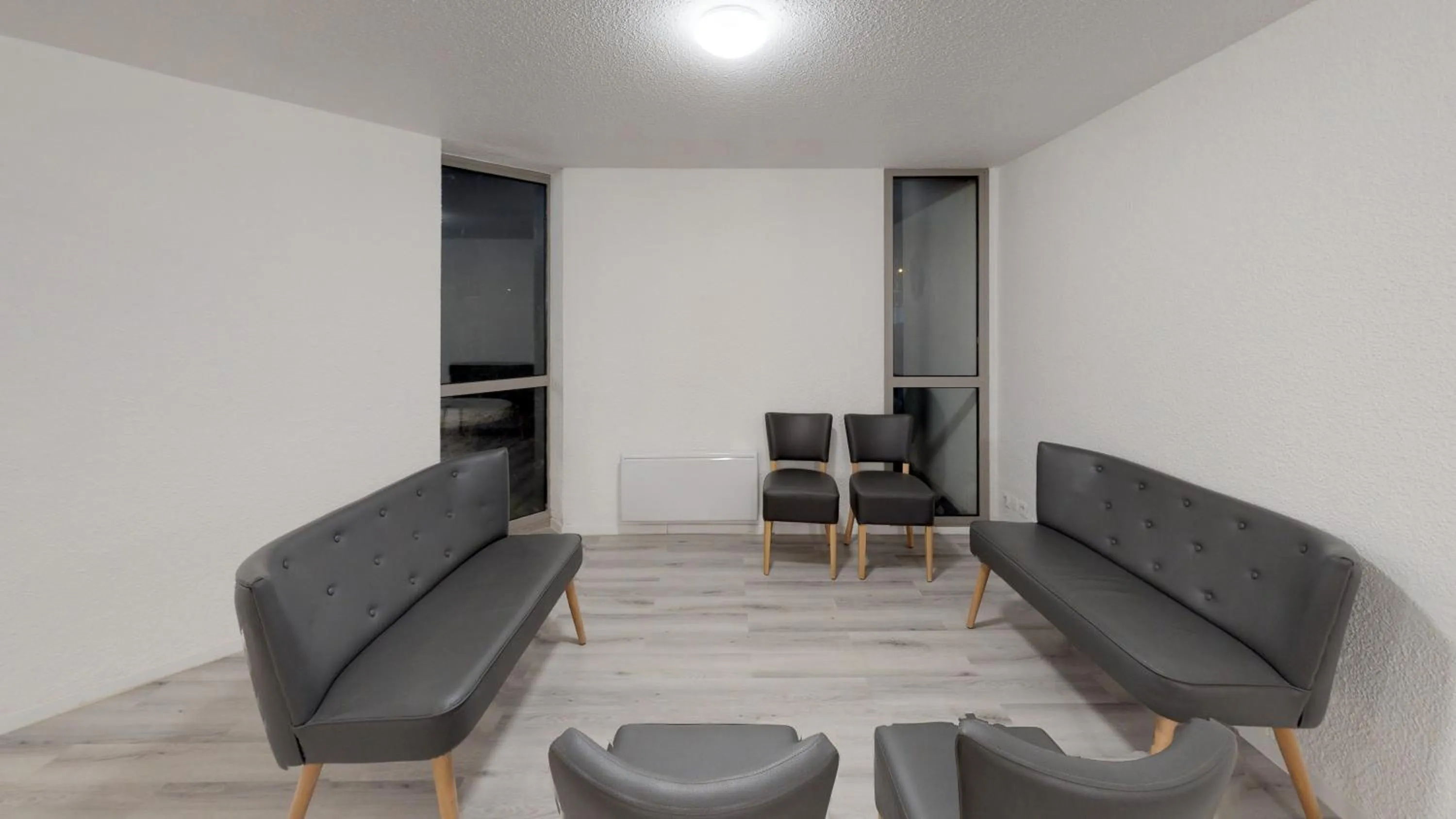 Seating area in Hôtel du stade ex Kyriad Direct Lille Est Stade Pierre Mauroy