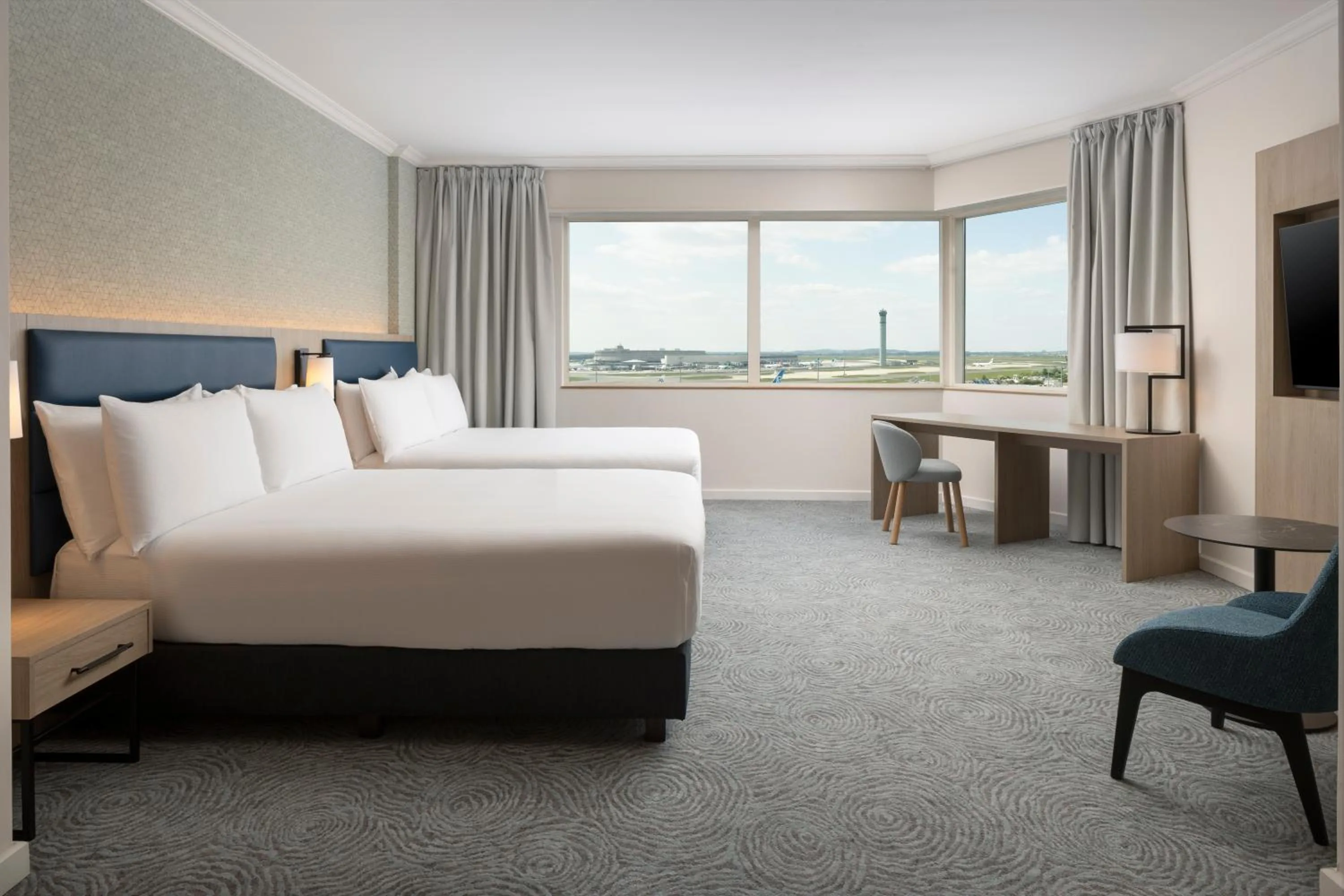 Photo of the whole room, Bed in Hilton Paris Charles De Gaulle Airport