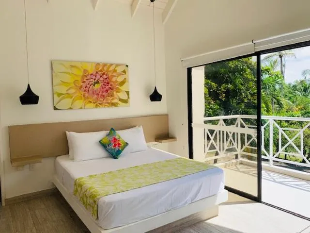 Bed in Casa de las Flores tropical