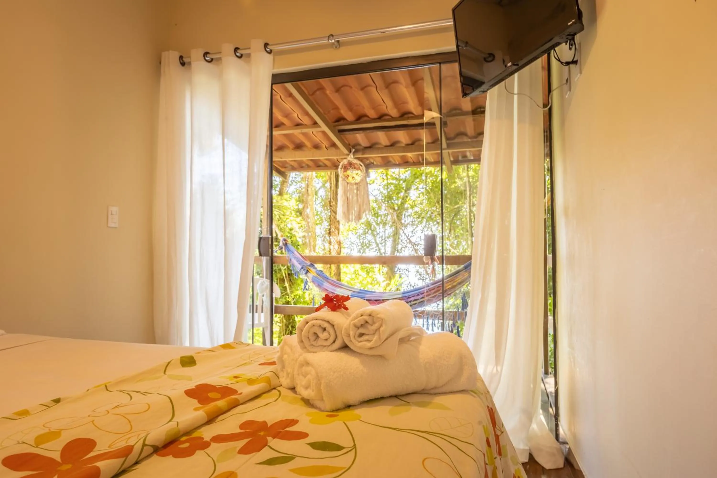 Bed in Pousada Lagamar