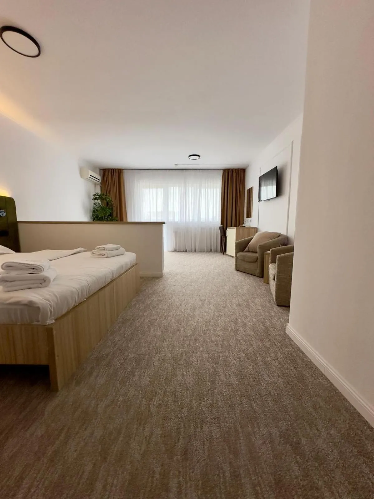 Living room, Bed in Hotel Gala