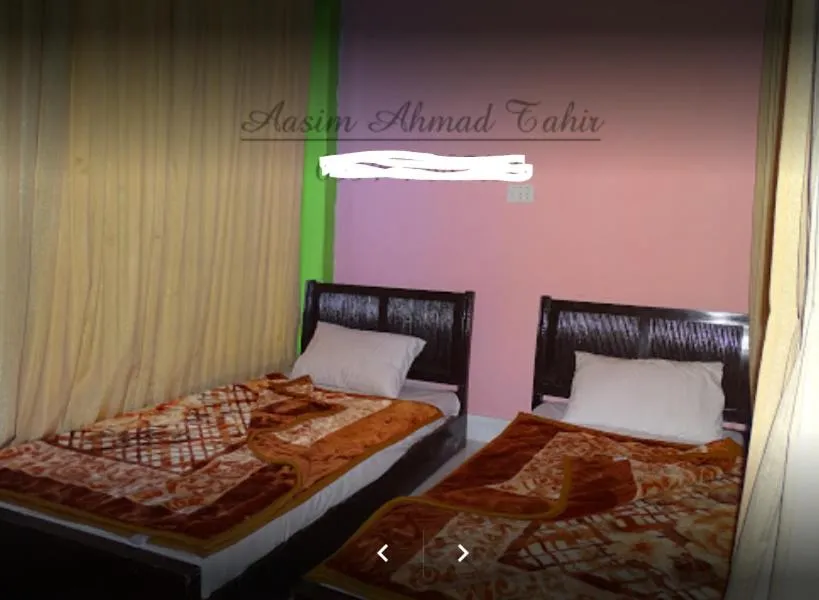 Bed in Flora Inn Hotel Naran