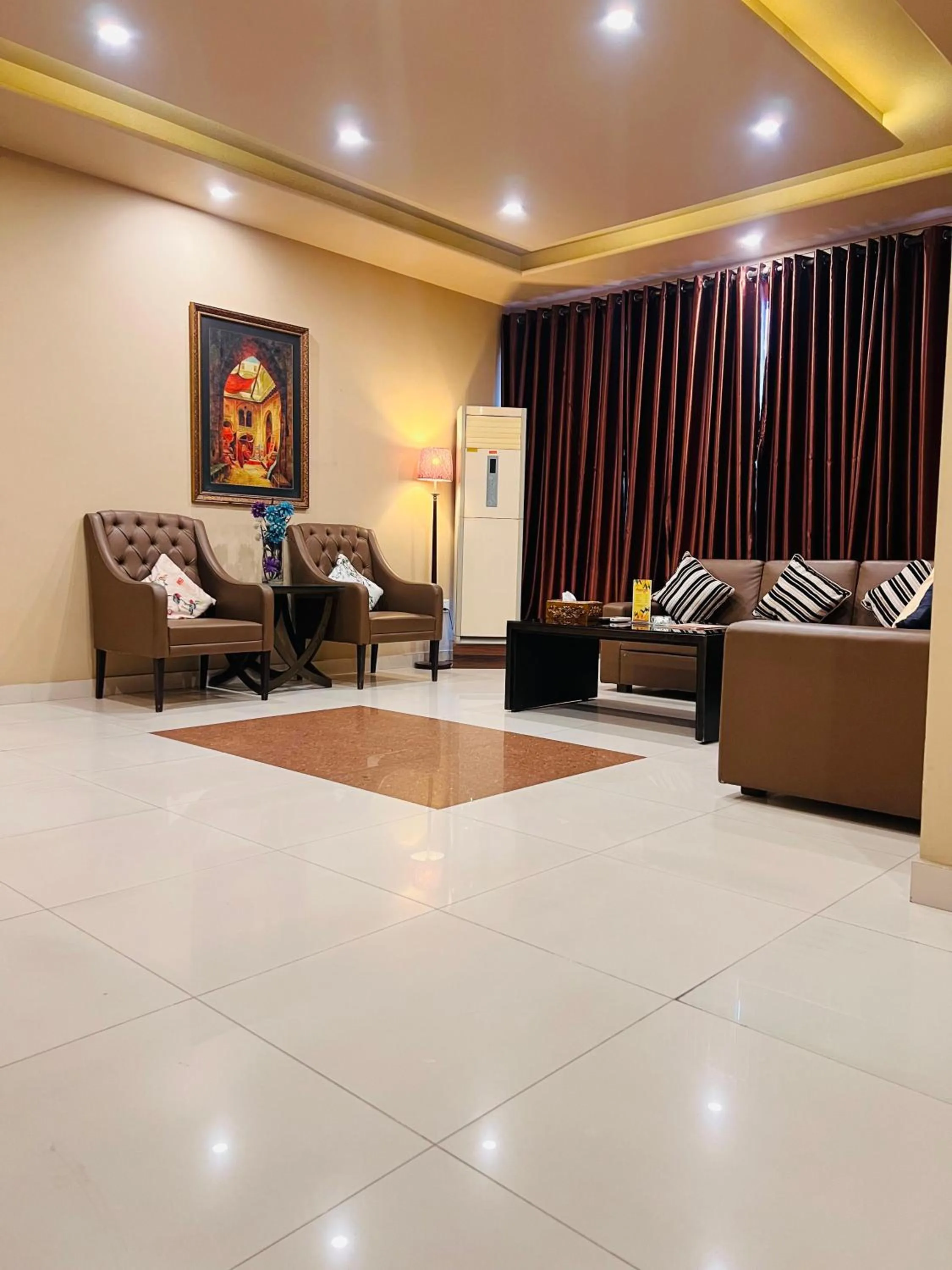 Lobby or reception in Grand Regent Hotel and Suites