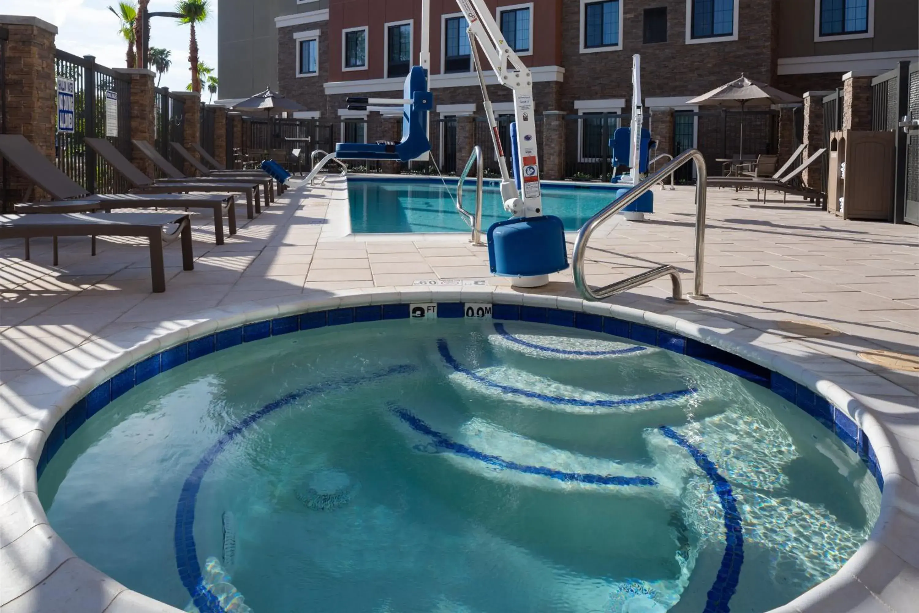 Swimming pool in Staybridge Suites - Phoenix – Biltmore Area by IHG Swimming pool in Staybridge Suites - Phoenix – Biltmore Area by IHG