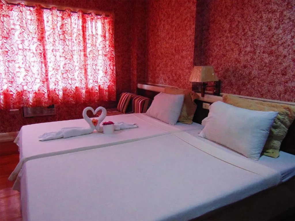 Bed in Stefanie Grace Inn