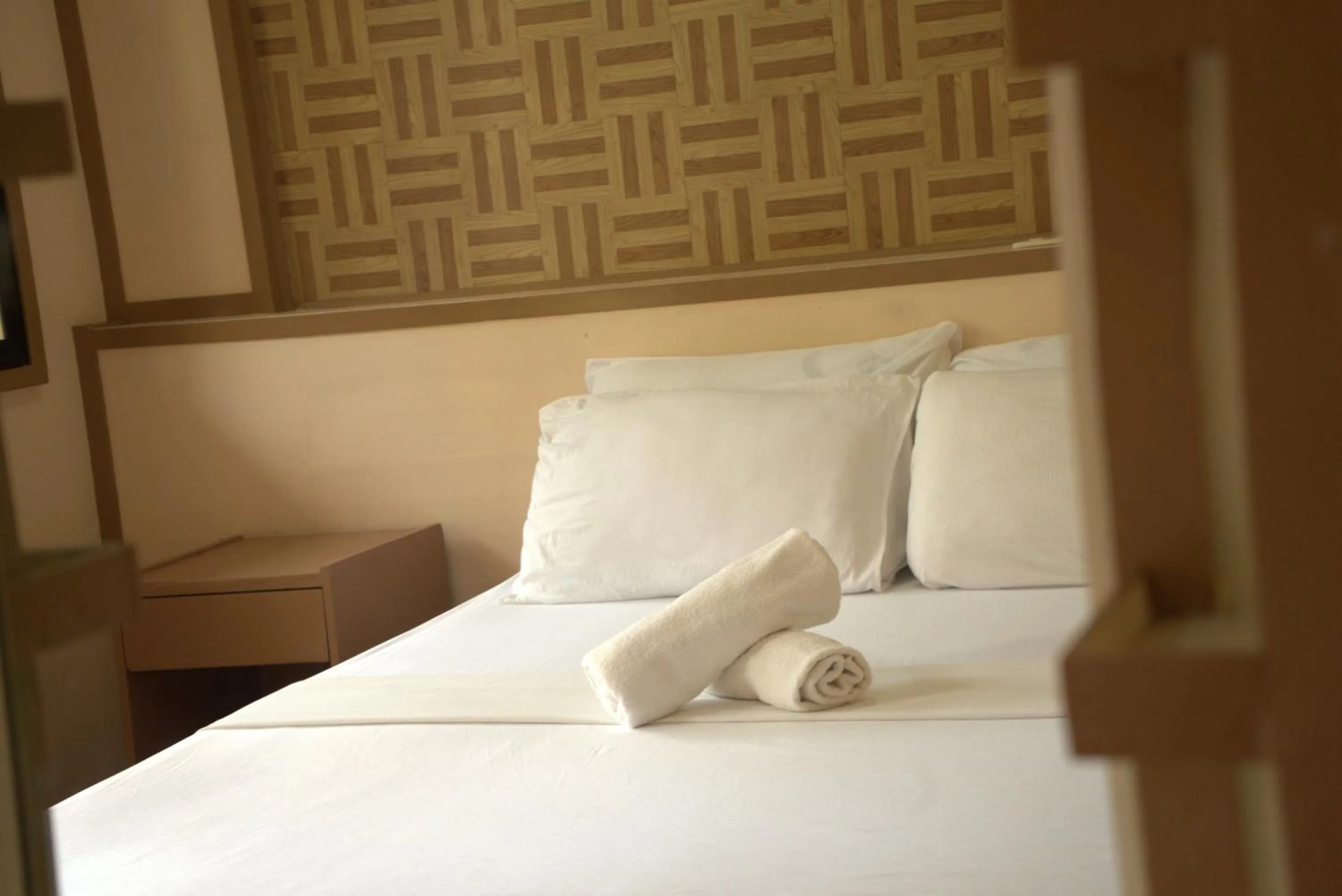 Bed in Stefanie Grace Inn