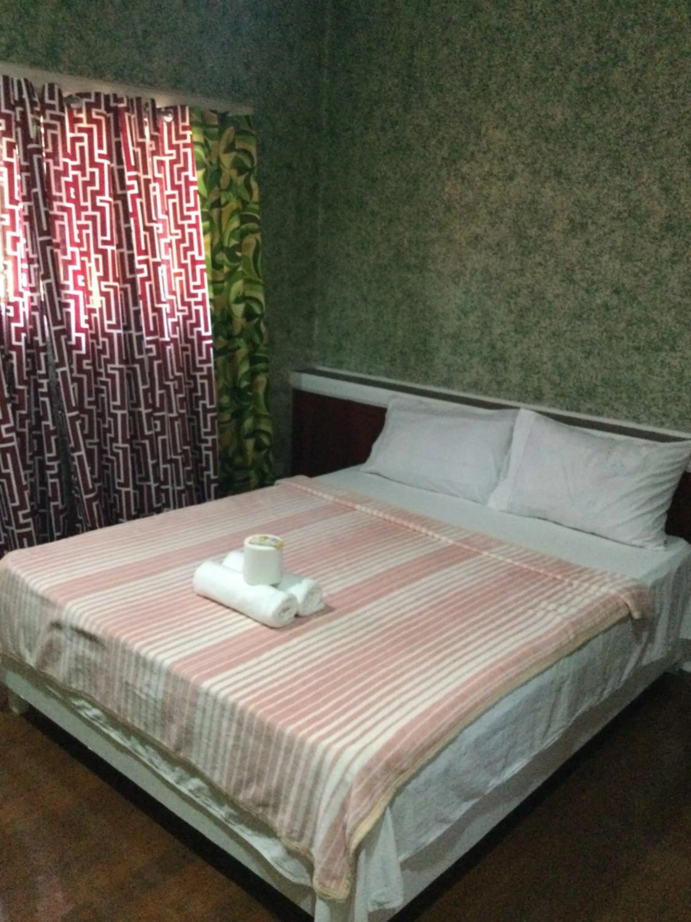 Bed in Stefanie Grace Inn
