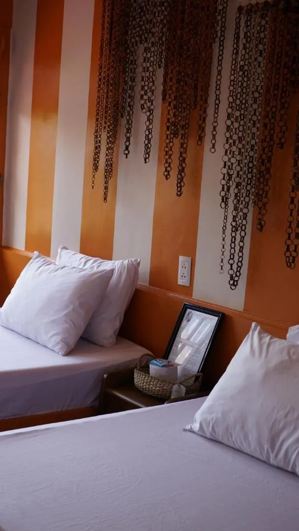 Bed in Stefanie Grace Inn