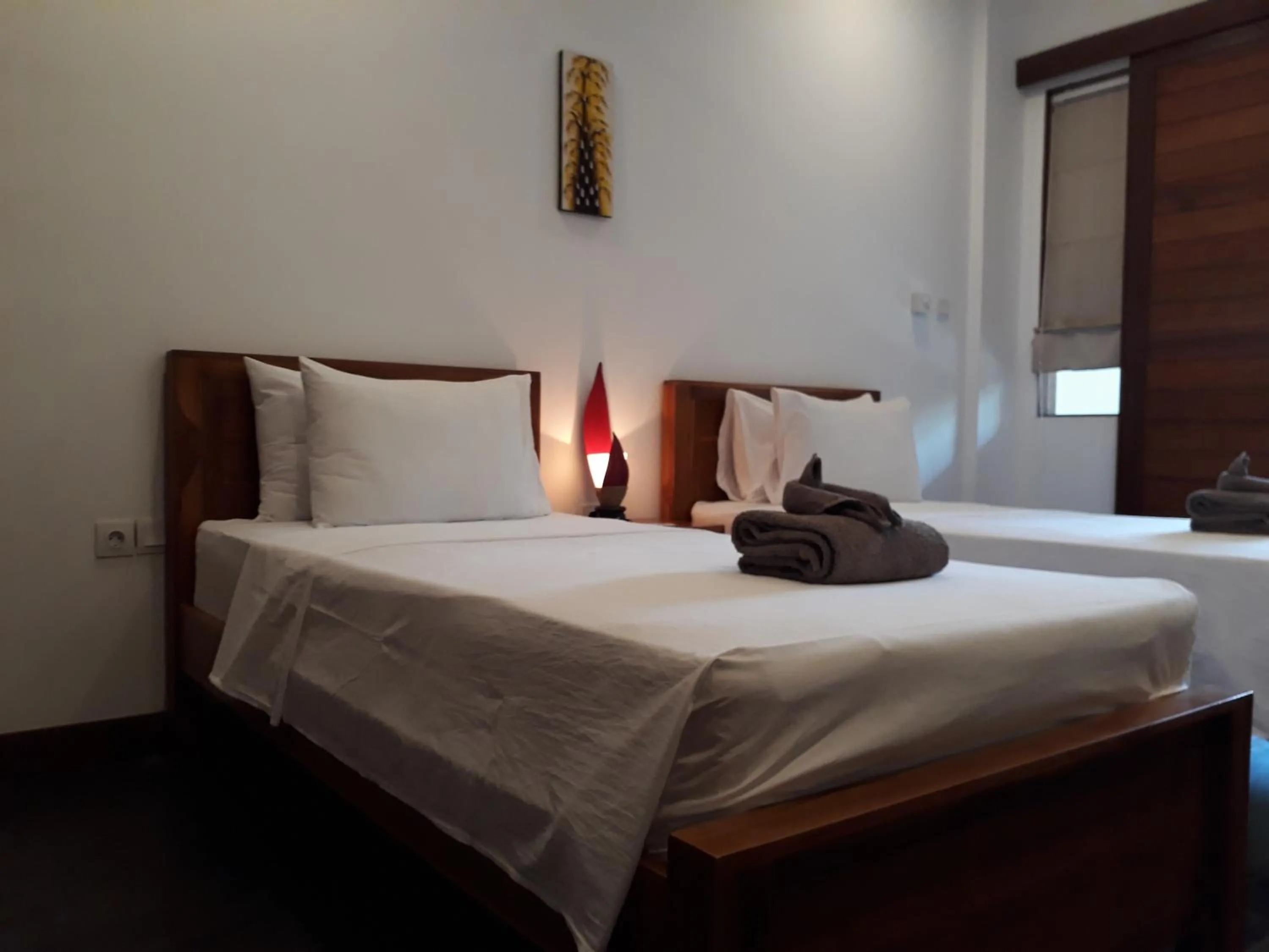 Bed in Dream Divers Resort