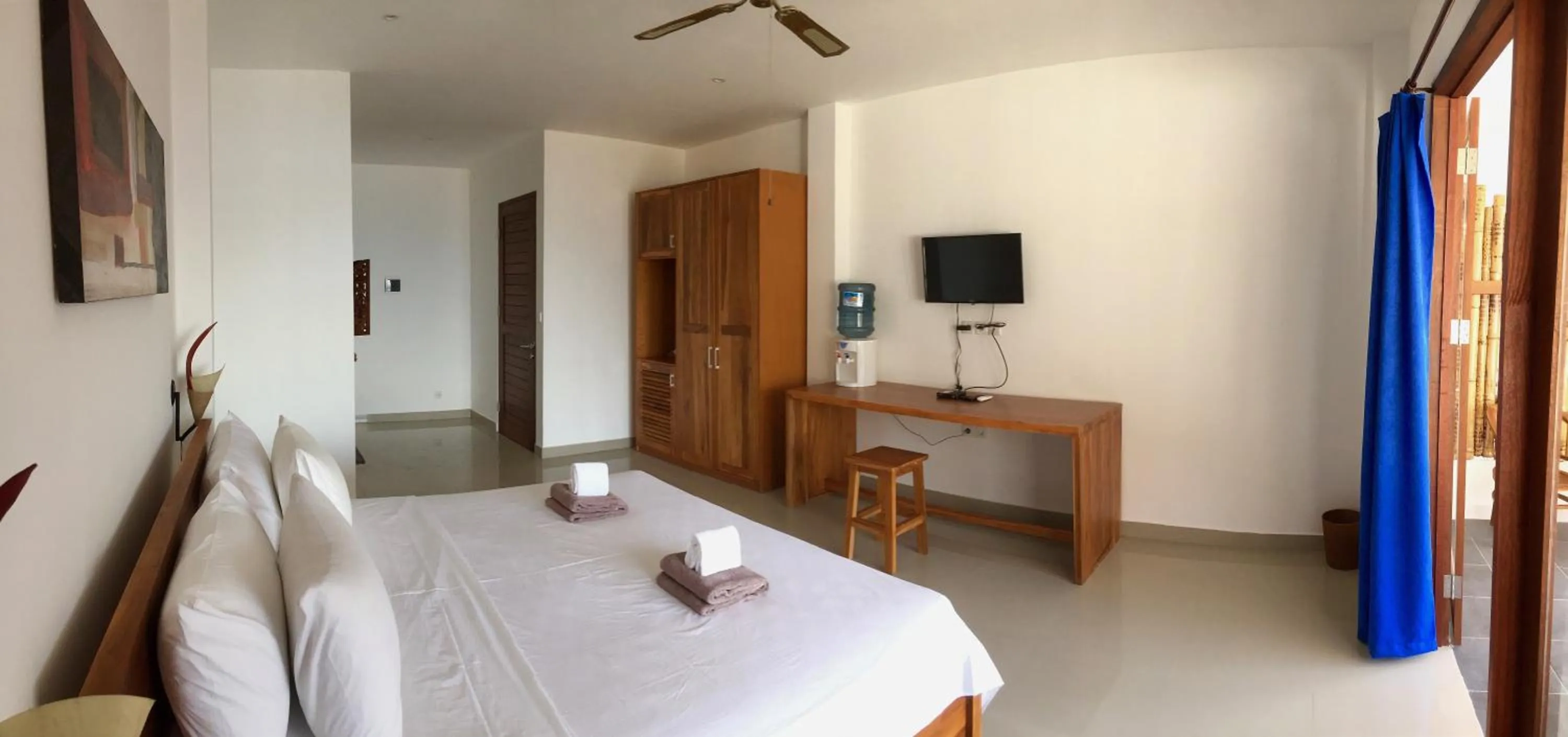 Patio, Bed in Dream Divers Resort