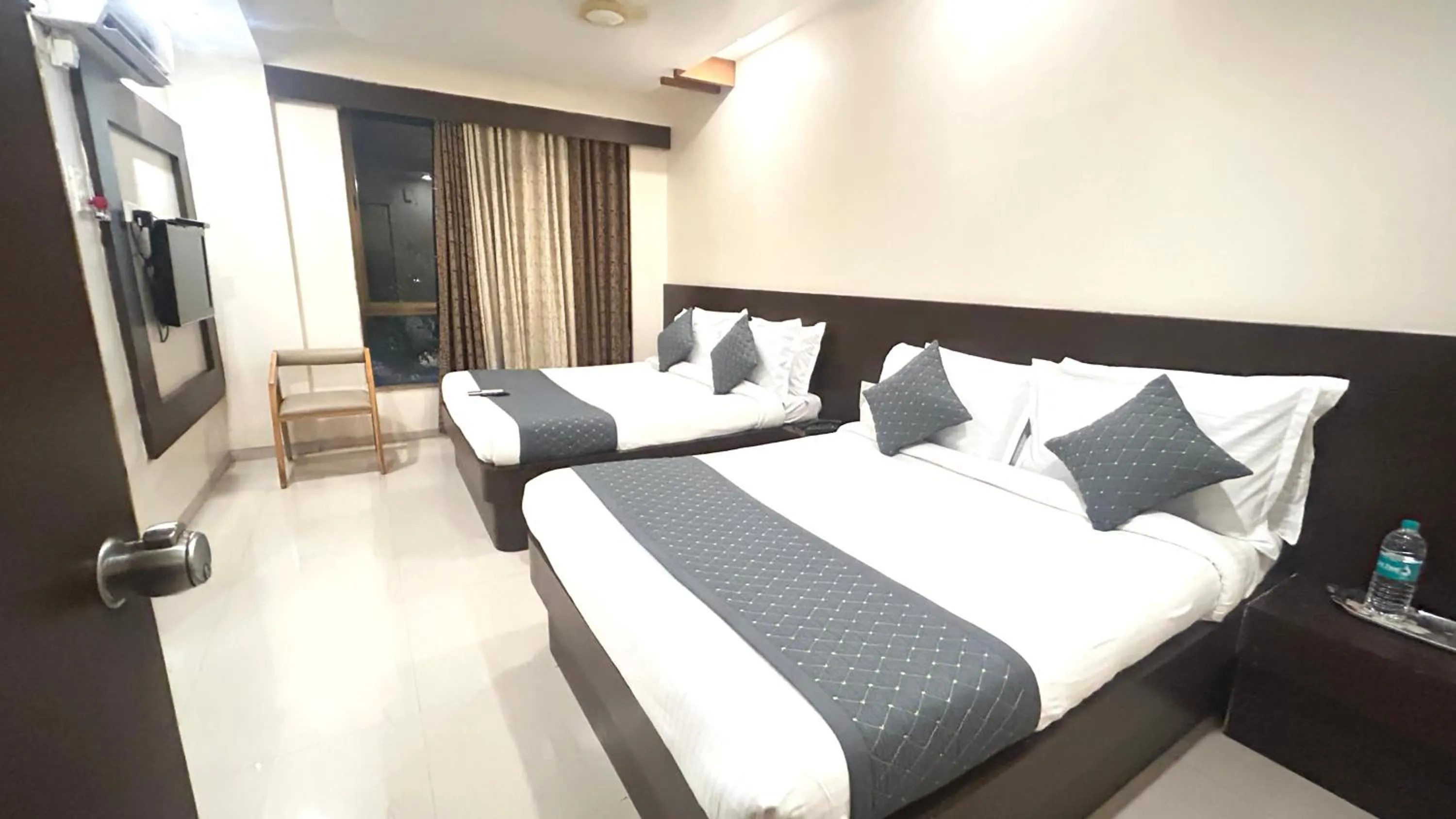 Photo of the whole room, Bed in Hotel Krishna Sai Kutir