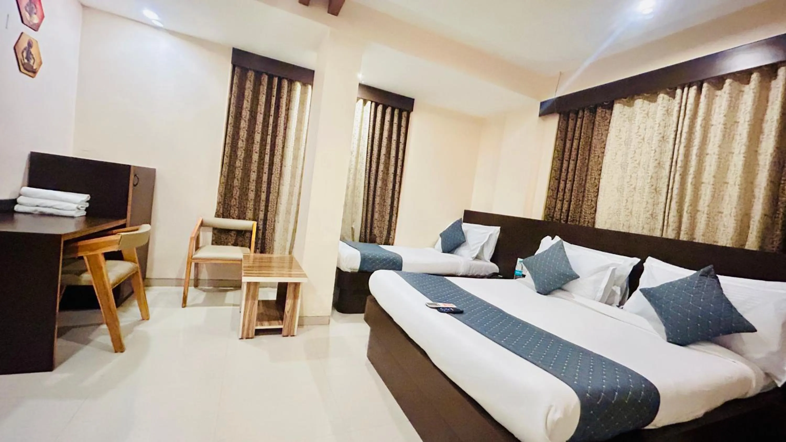 Bed in Hotel Krishna Sai Kutir