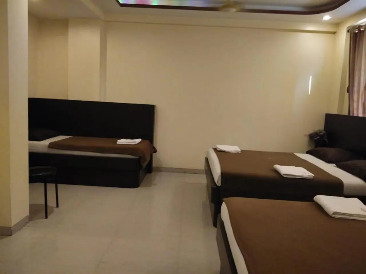 Bed in Hotel Krishna Sai Kutir