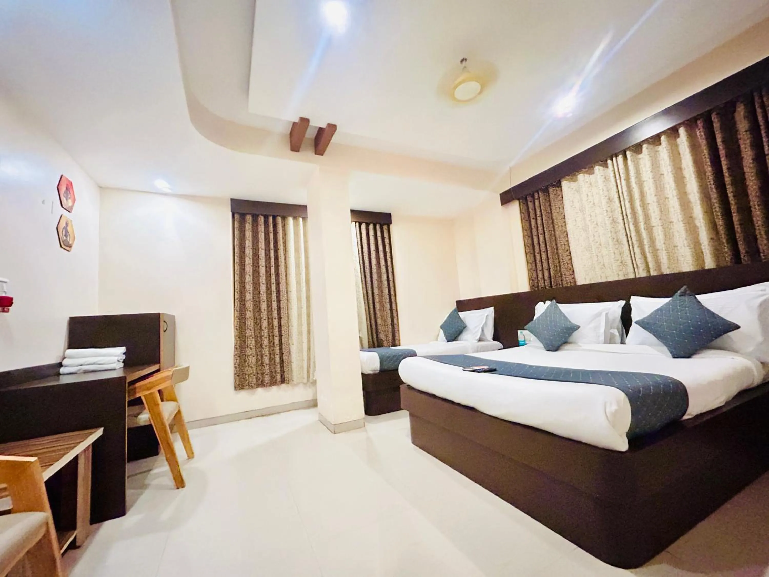 Bed in Hotel Krishna Sai Kutir