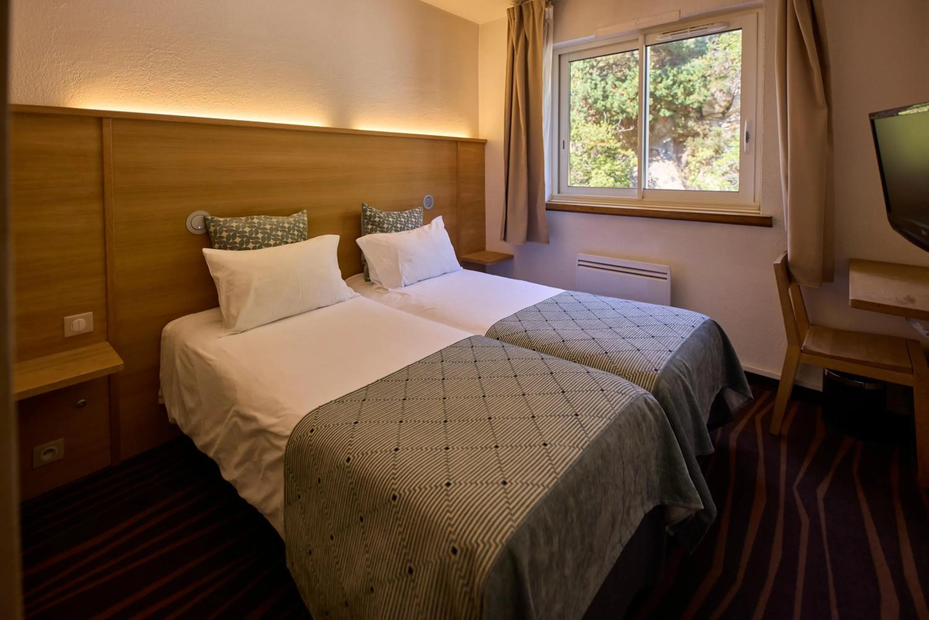 Bedroom, Bed in Hôtel Le Grand Tétras