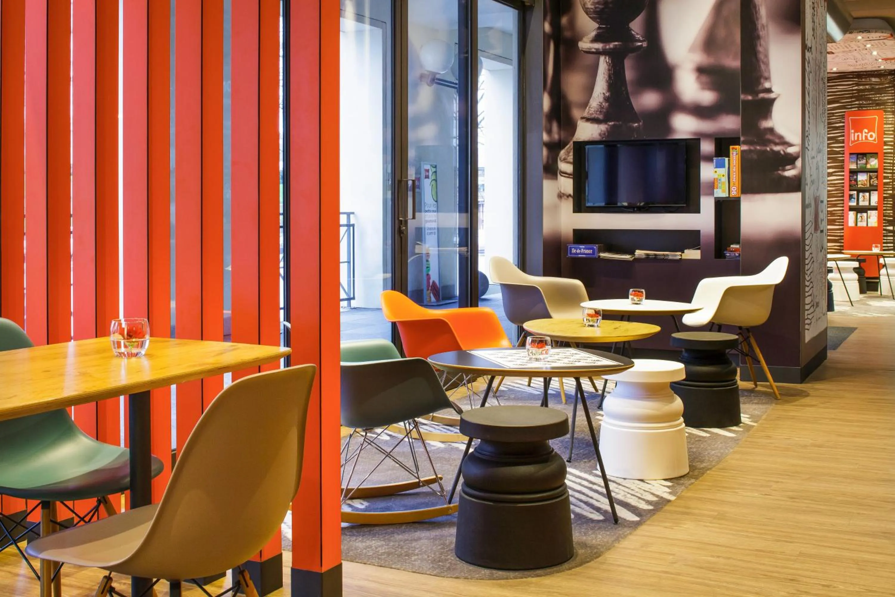 Communal lounge/ TV room in ibis Versailles Château