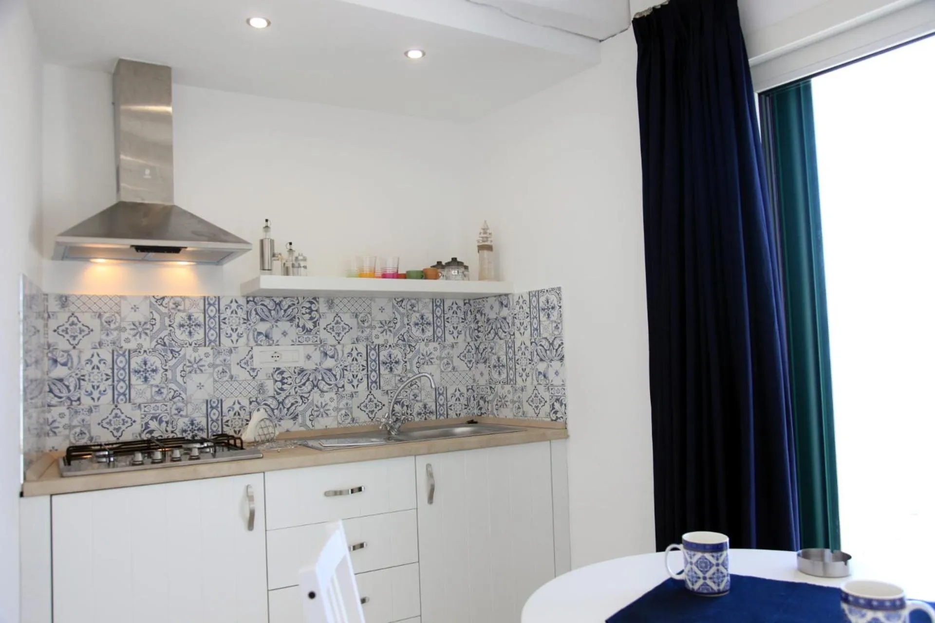 Kitchen or kitchenette in Le Tolde del Corallone