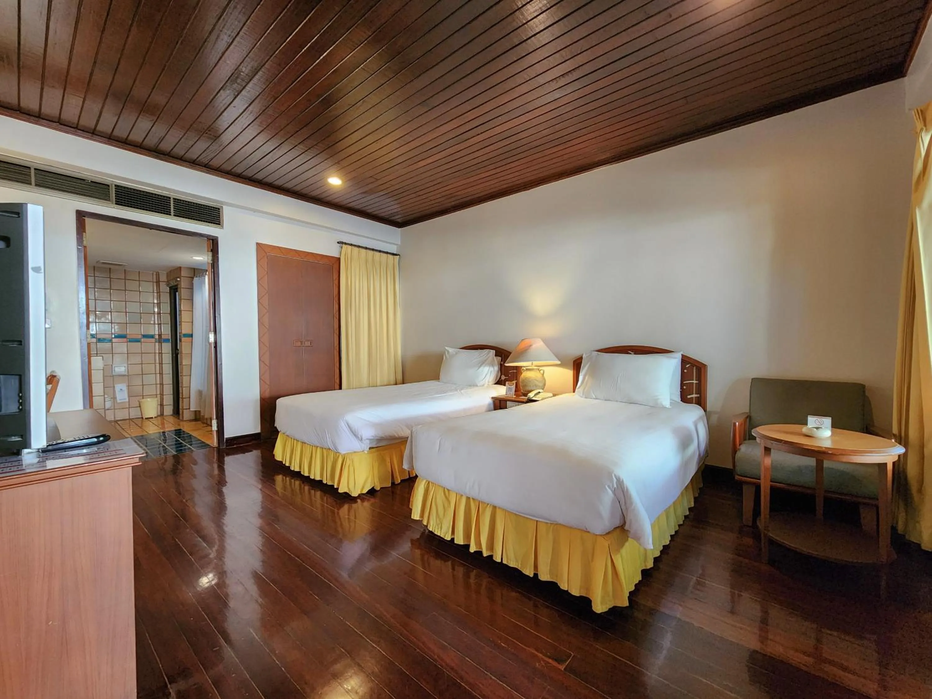 Bed in Garden Sea View Resort